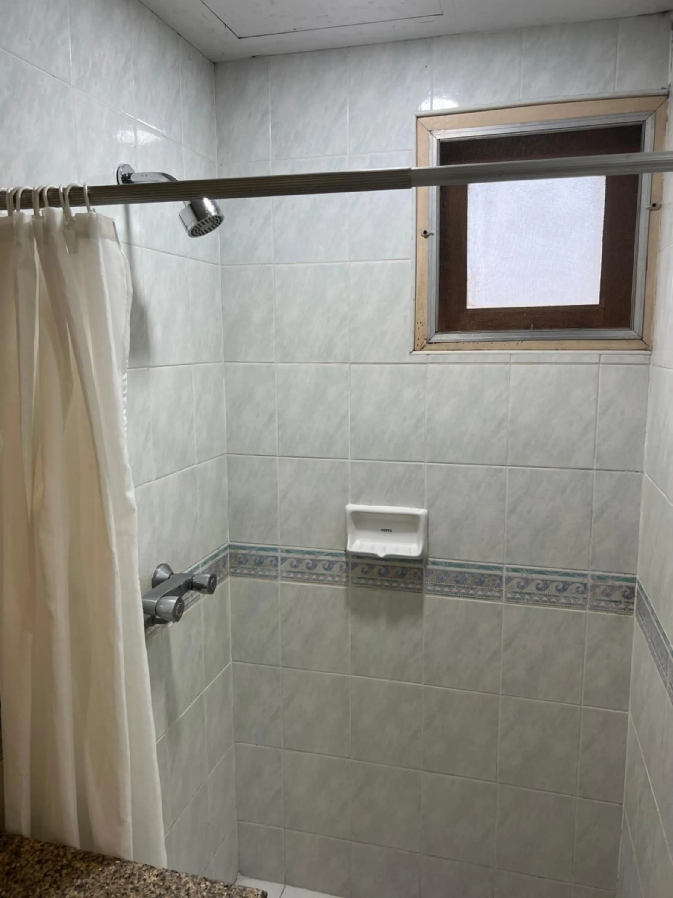 Bathroom in Mall Suites Hotel