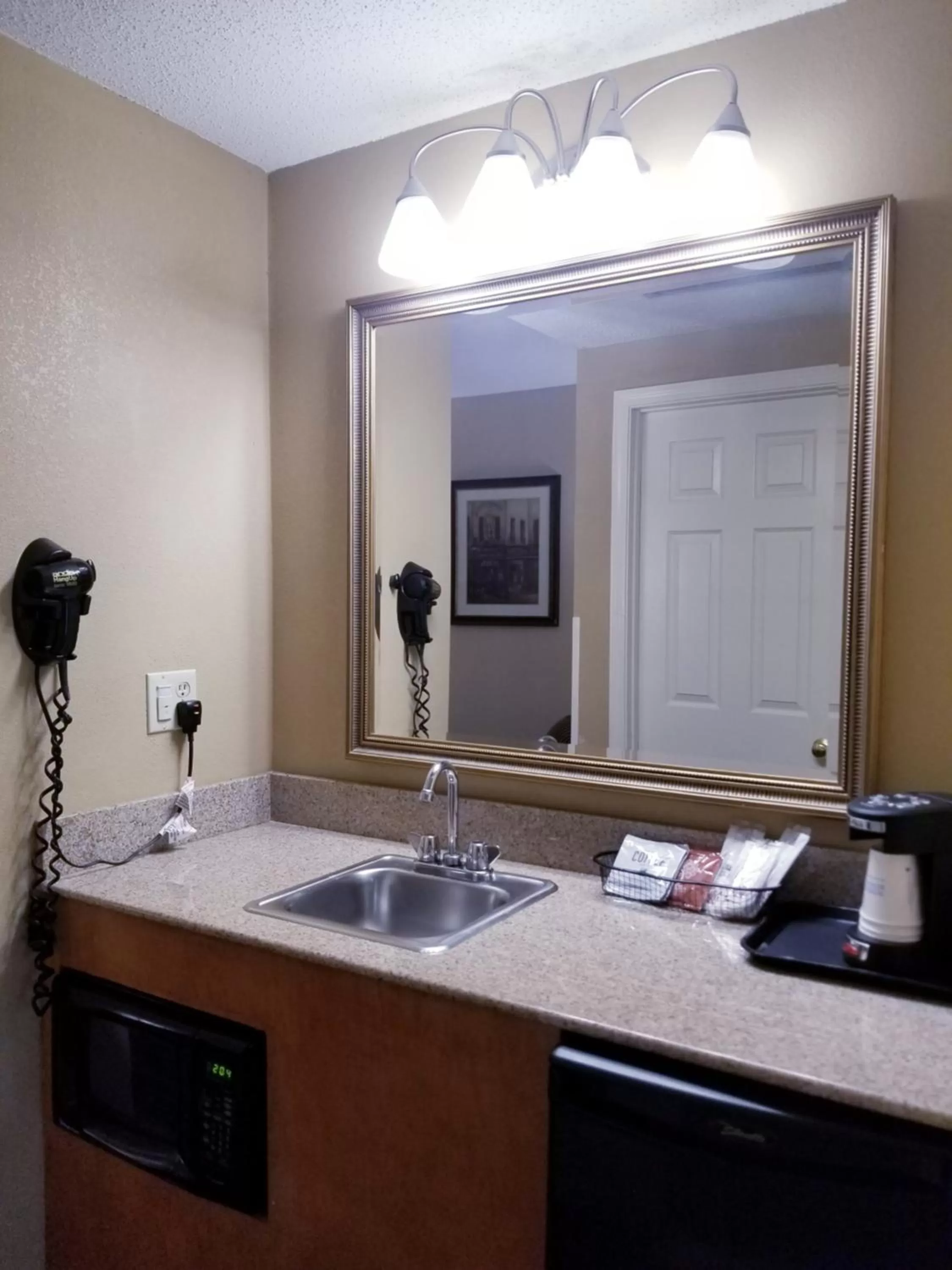 Bathroom in Baymont by Wyndham Indianapolis Northwest