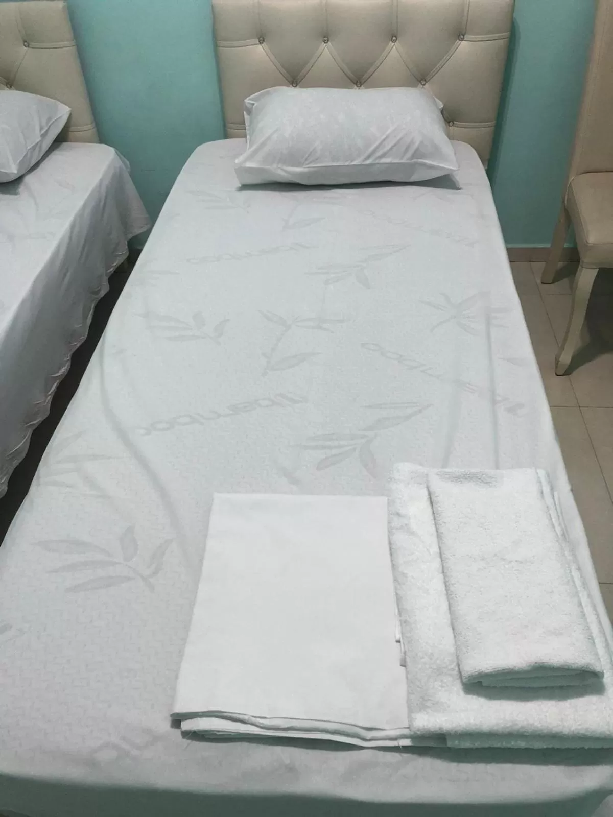 Bed in Orange Home Hotel