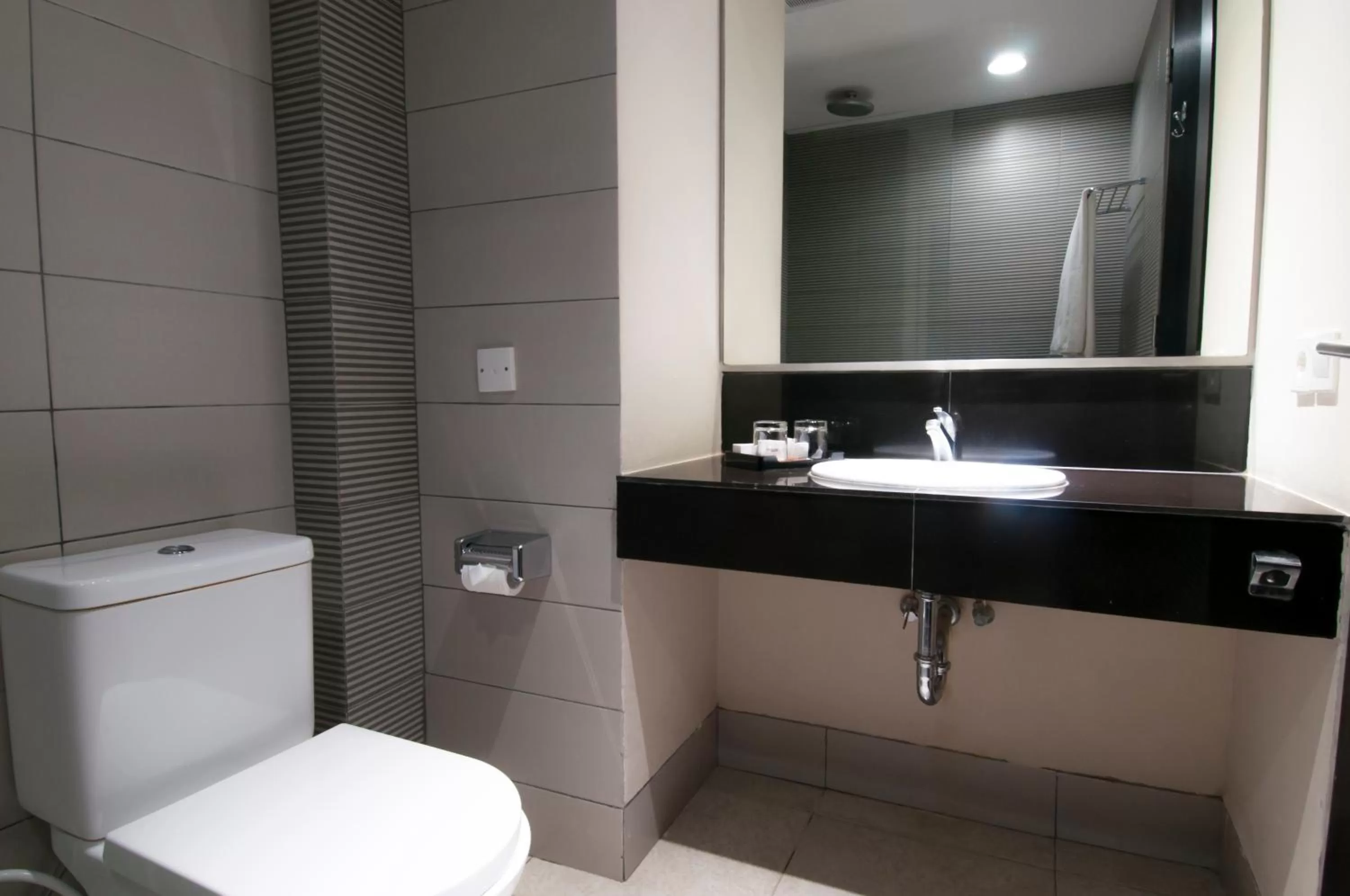 Bathroom in 100 Sunset Kuta Hotel & Ballroom