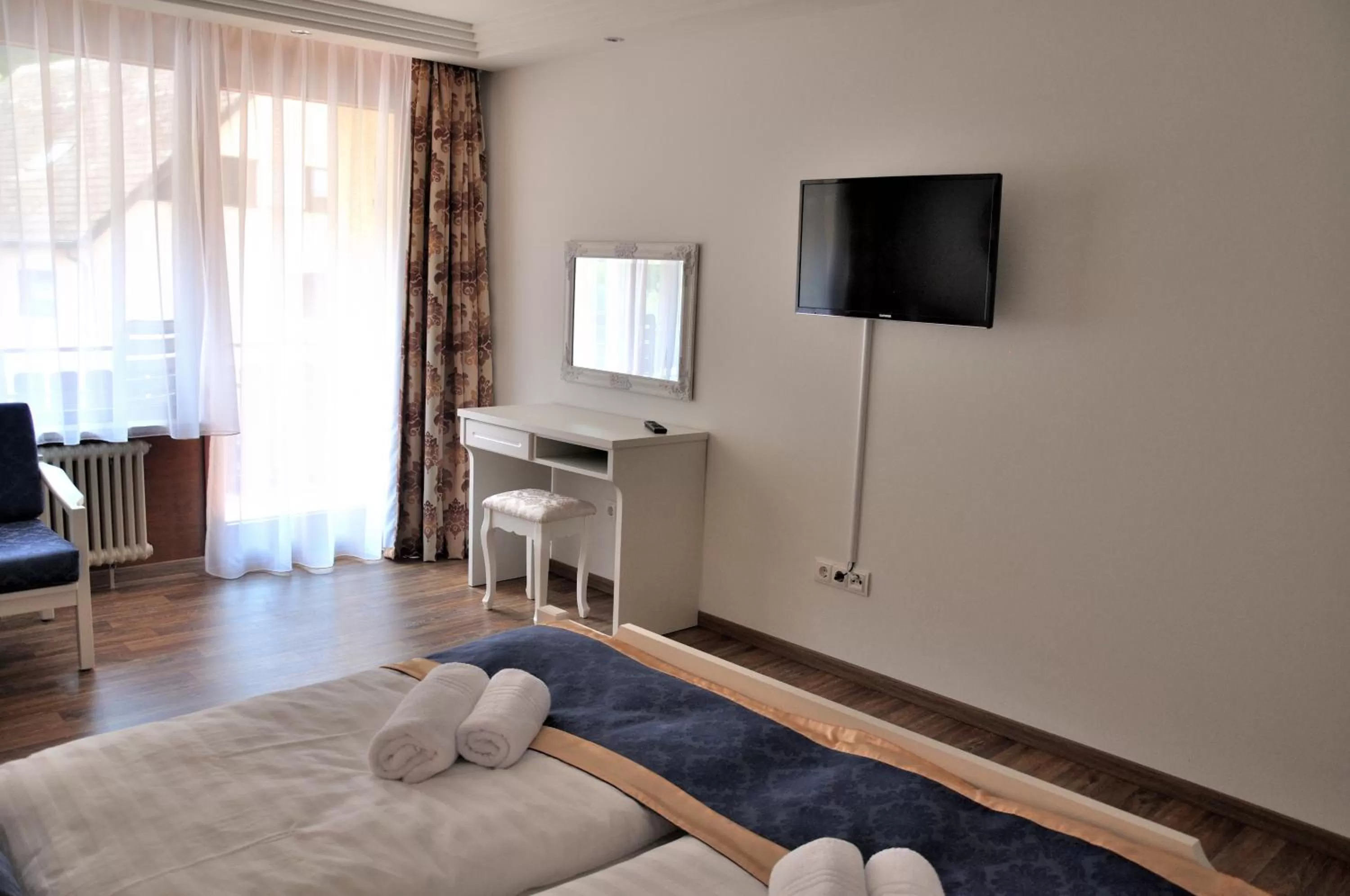 Photo of the whole room, TV/Entertainment Center in Hotel Eleon