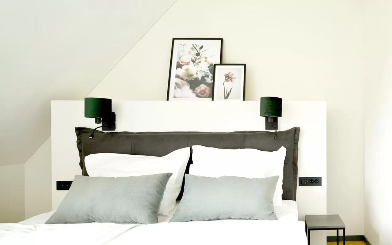 Bed in Hotel Maribor & Garden Rooms