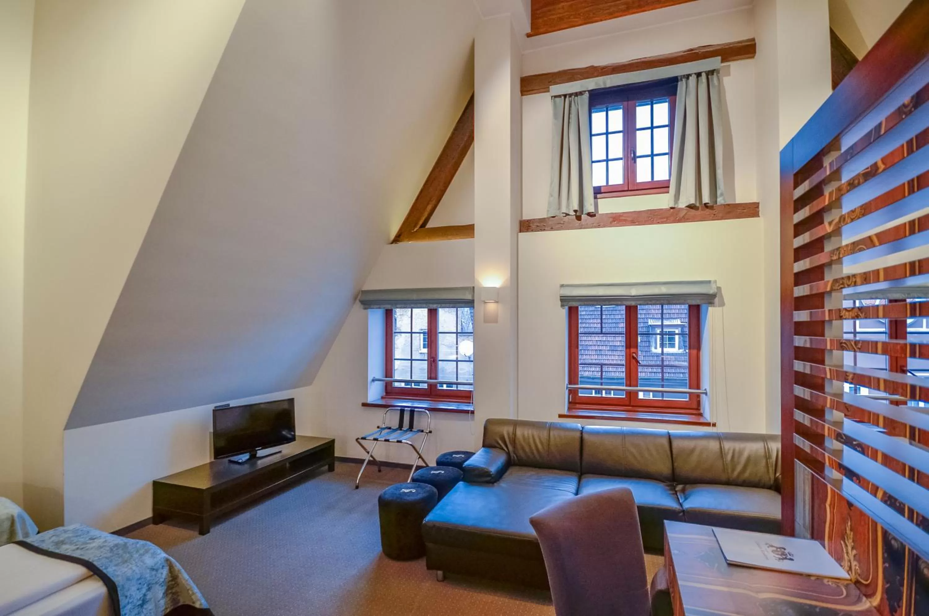 Living room, Bed in Celestin Residence