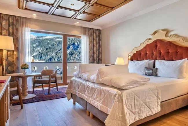 Bed in Hotel Sassongher