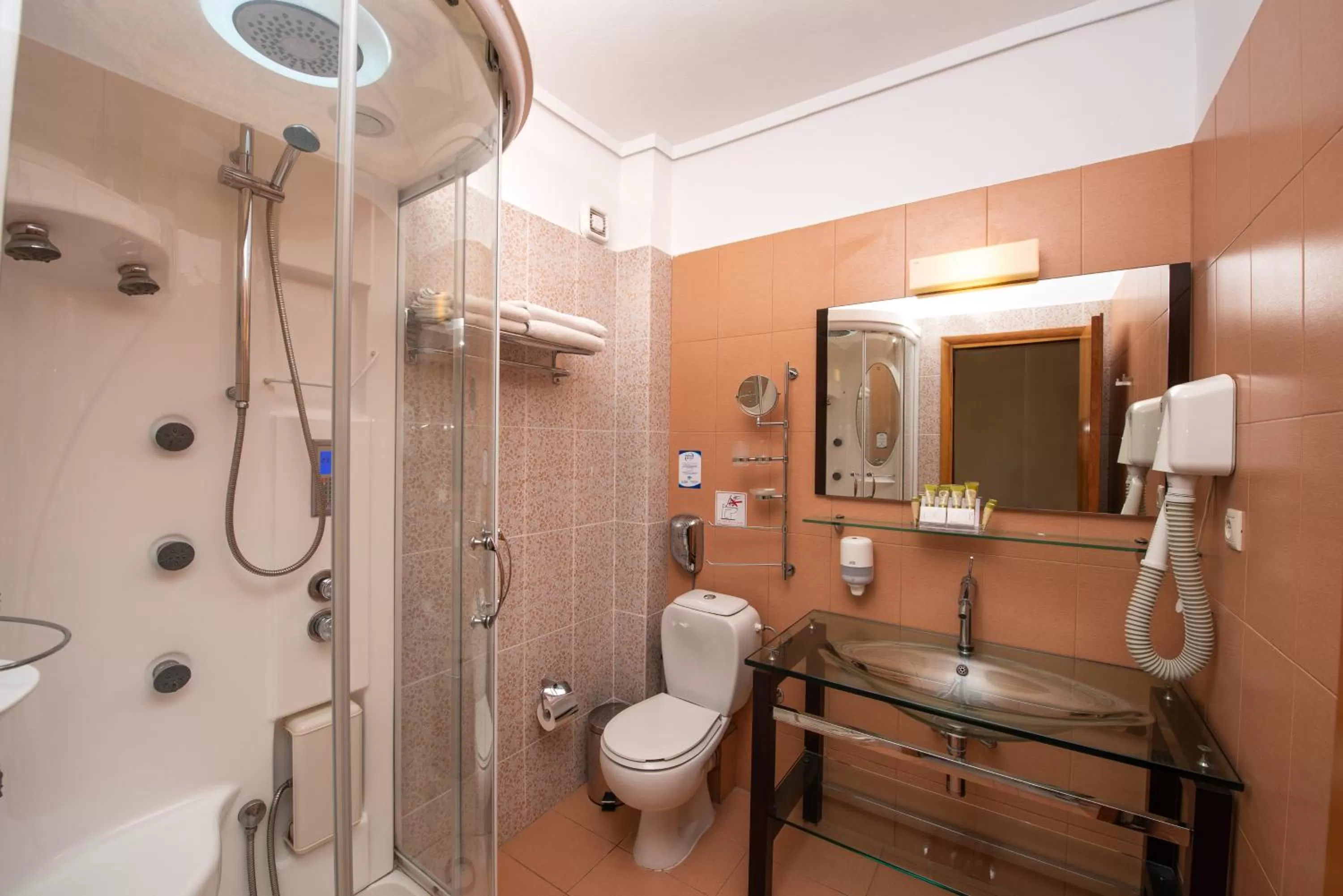 Shower in Heliotrope Hotels