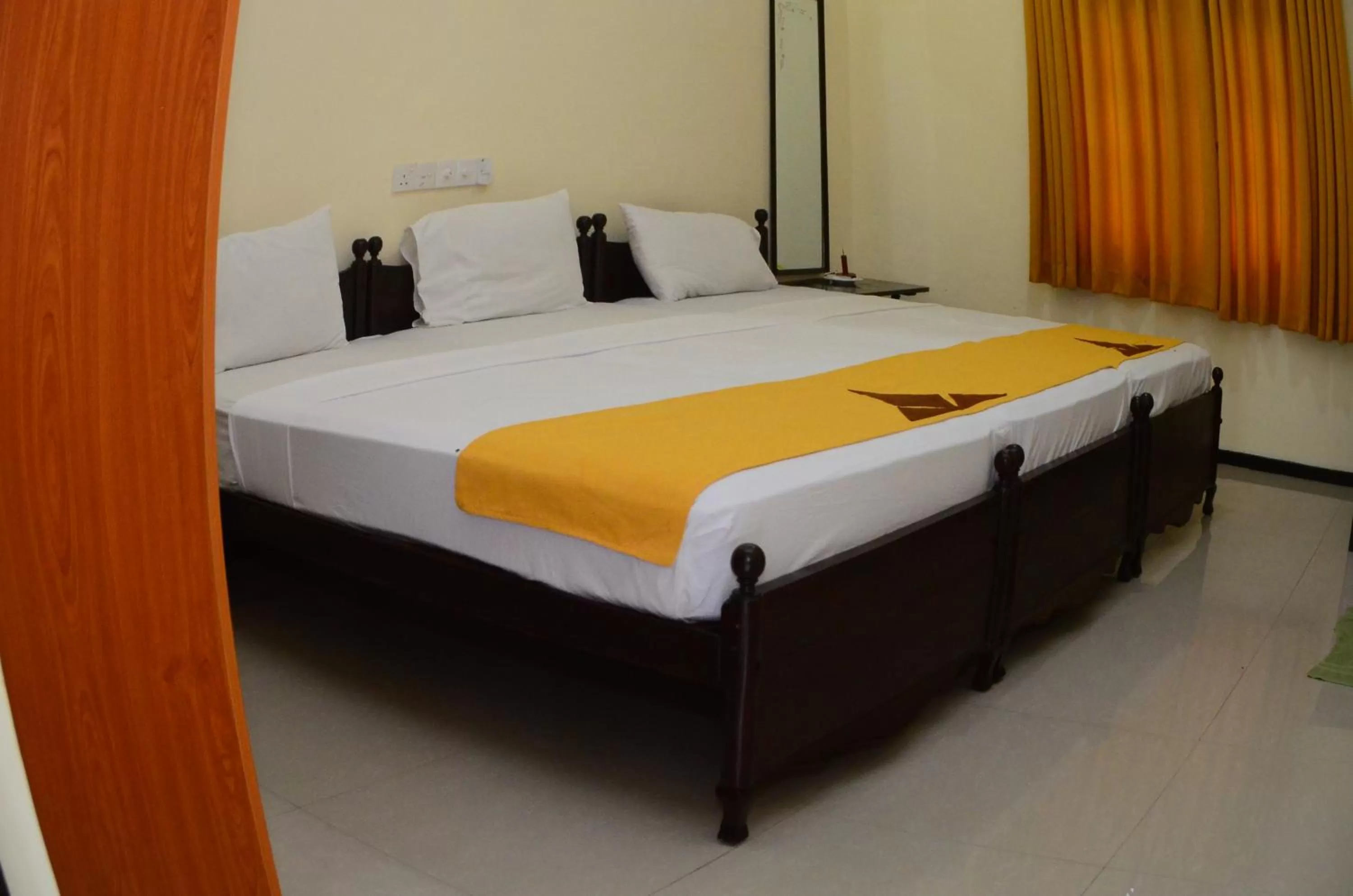 Bed in Jayasinghe Holiday Resort