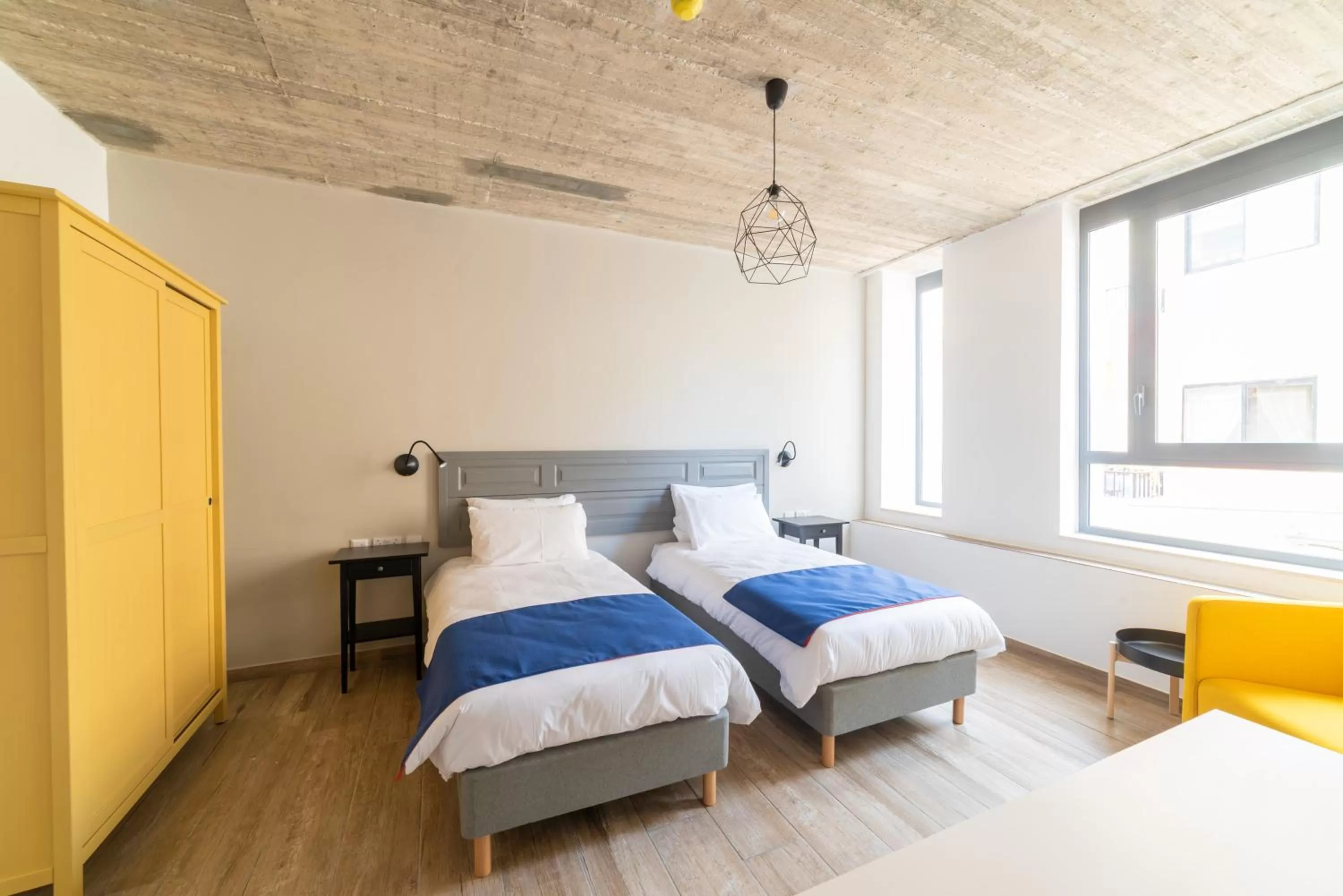 Bed in Chapter 5 Hotel