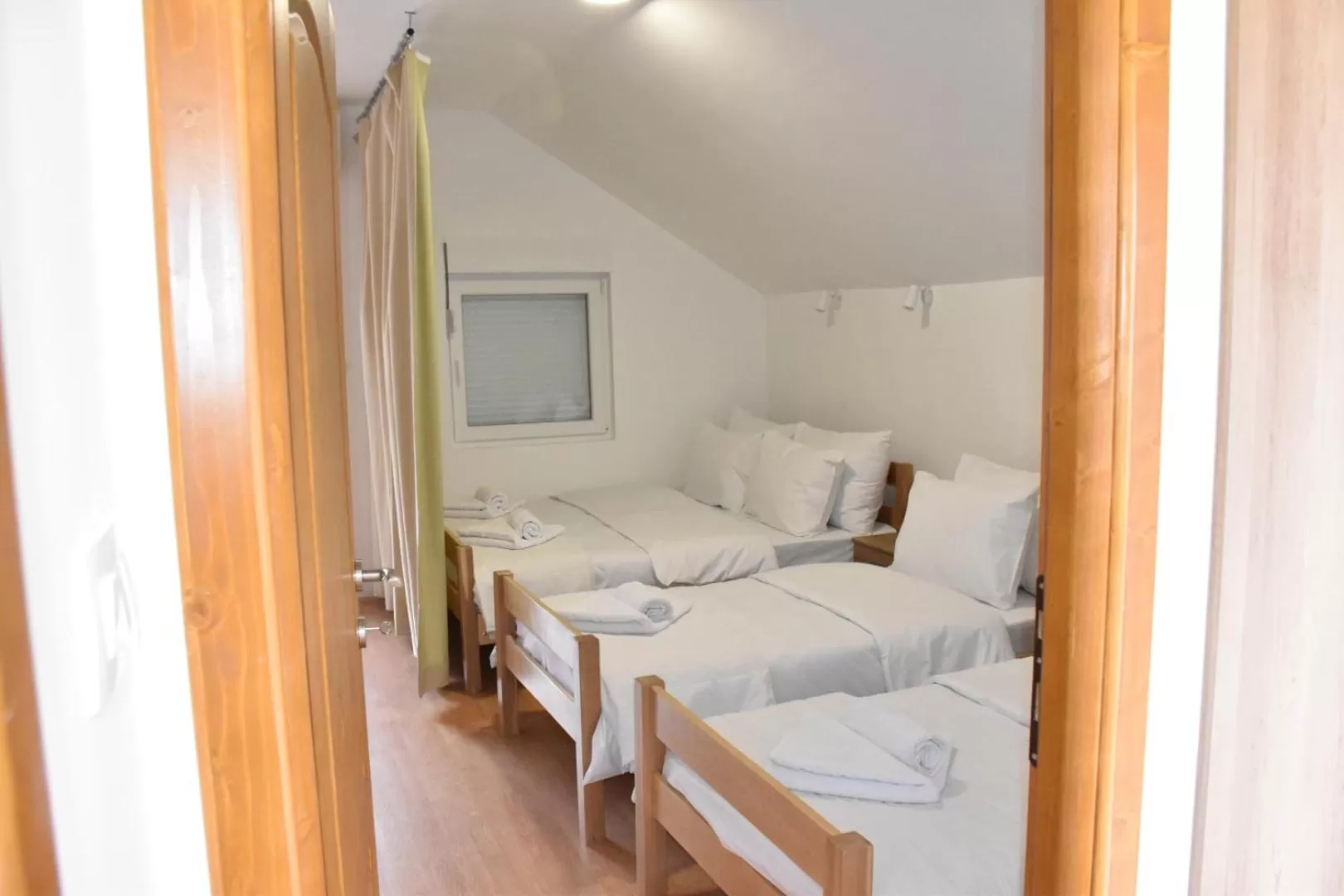 Bed in OSTROG Aparthotel KOLIBA-VLASTNIŠTVO MANASTIRA OSTROG