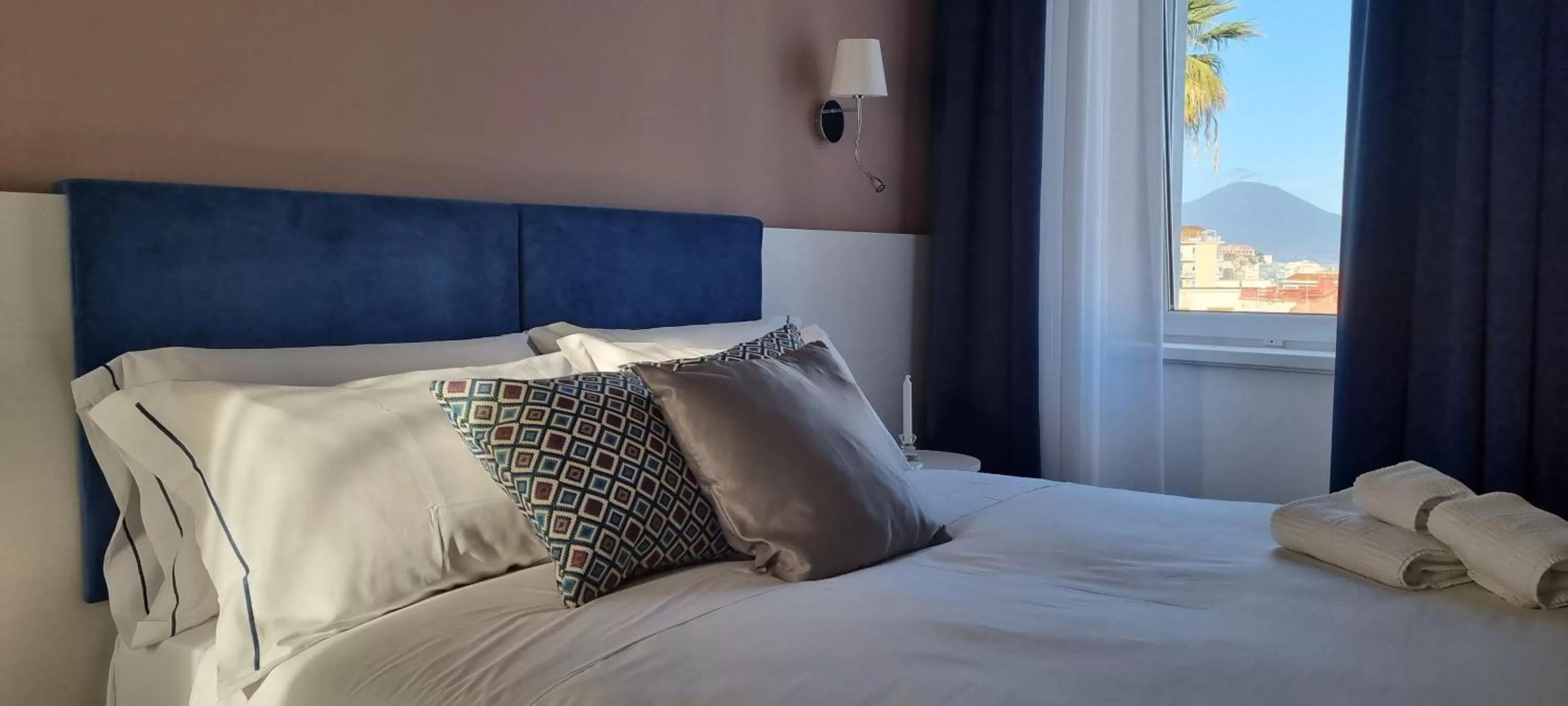 Bed in Palazzo Cappuccini Art Relais