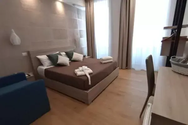 Triple Room with Private Bathroom in B&B LE MUSE Triple Room with Private Bathroom in B&B LE MUSE