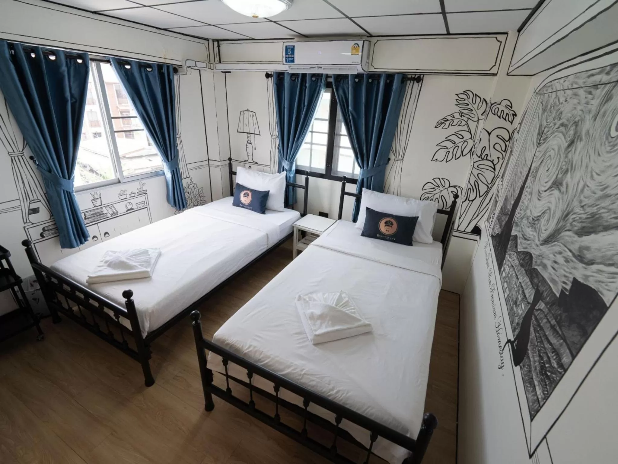 Bed in RoomQuest Chiang Mai Tha Phae