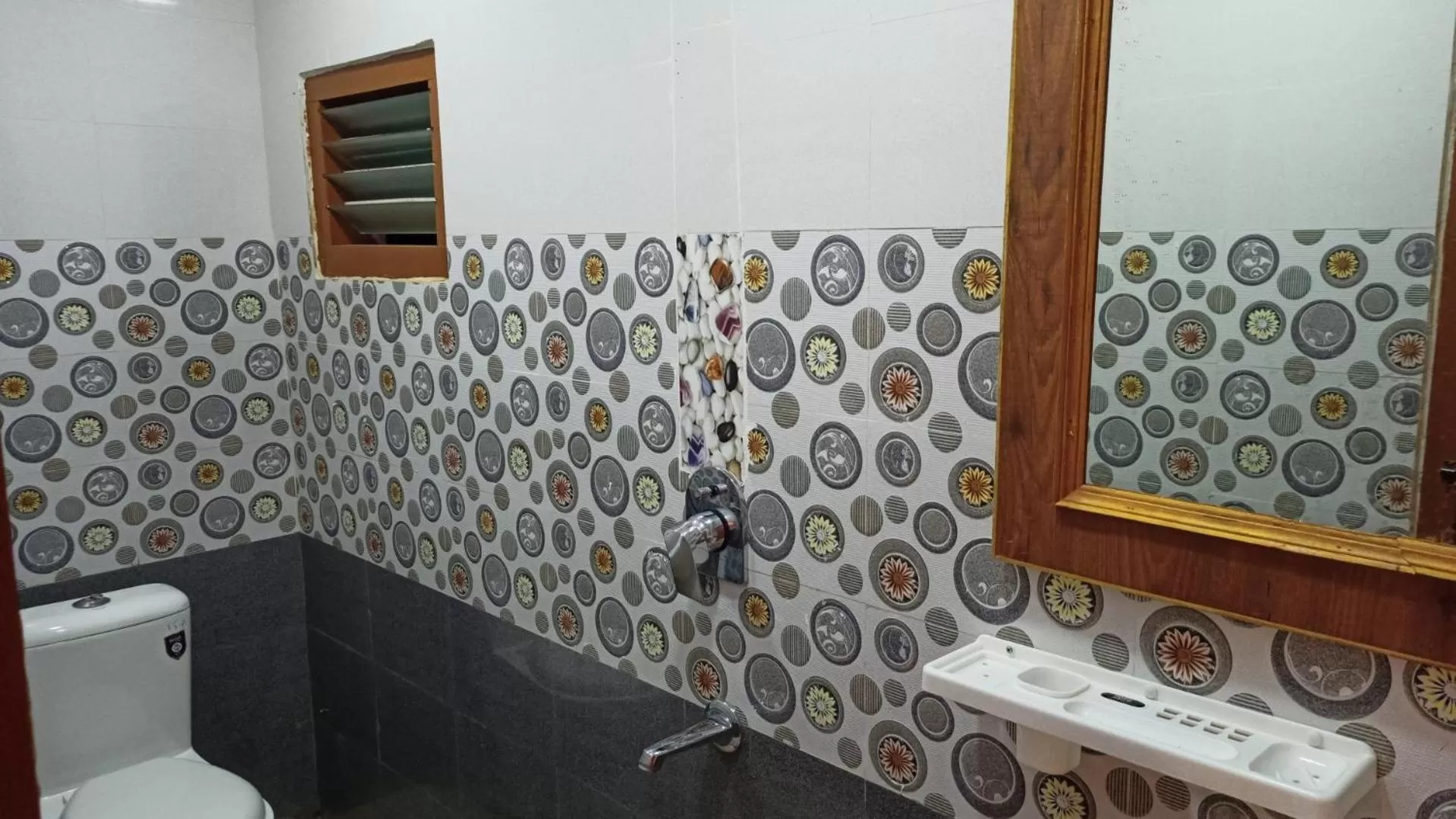 Bathroom in Aarthi Residency