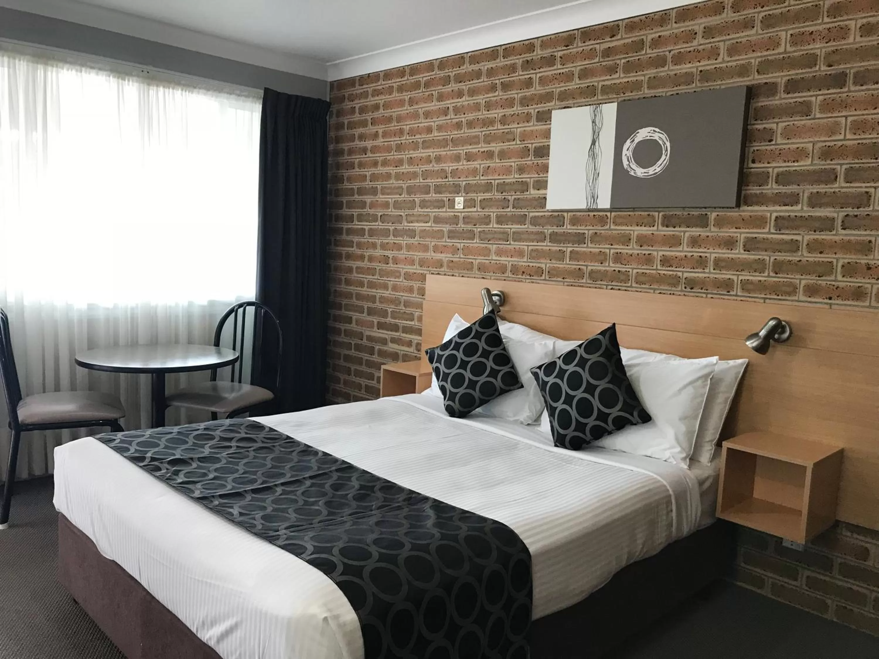 Bed in Jumbuck Motor Inn