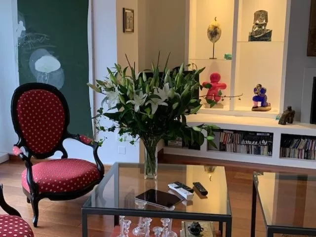 Seating area in Le Patio Père Pigne Guestroom