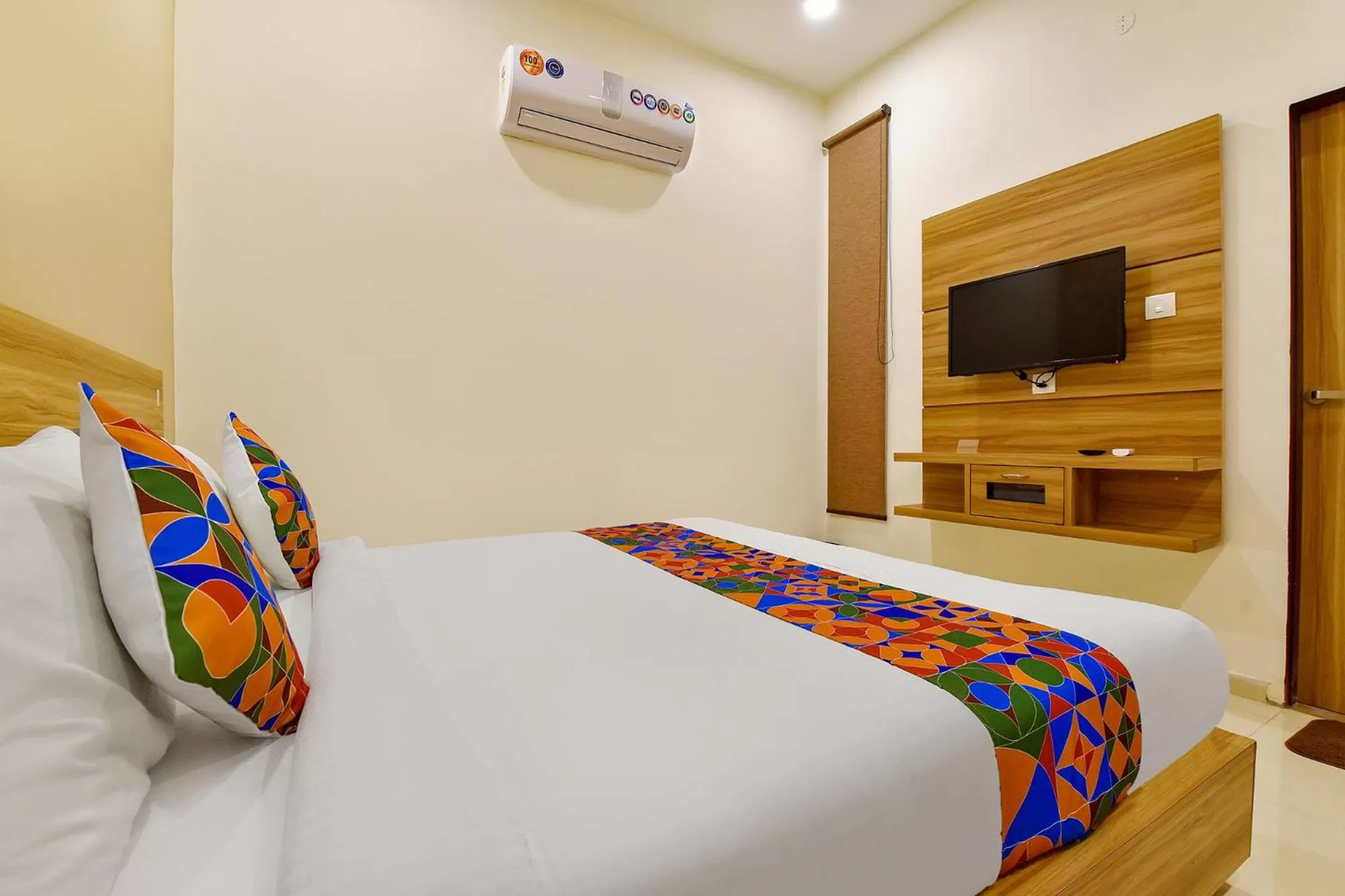 Bed in FabHotel Prime Oxus