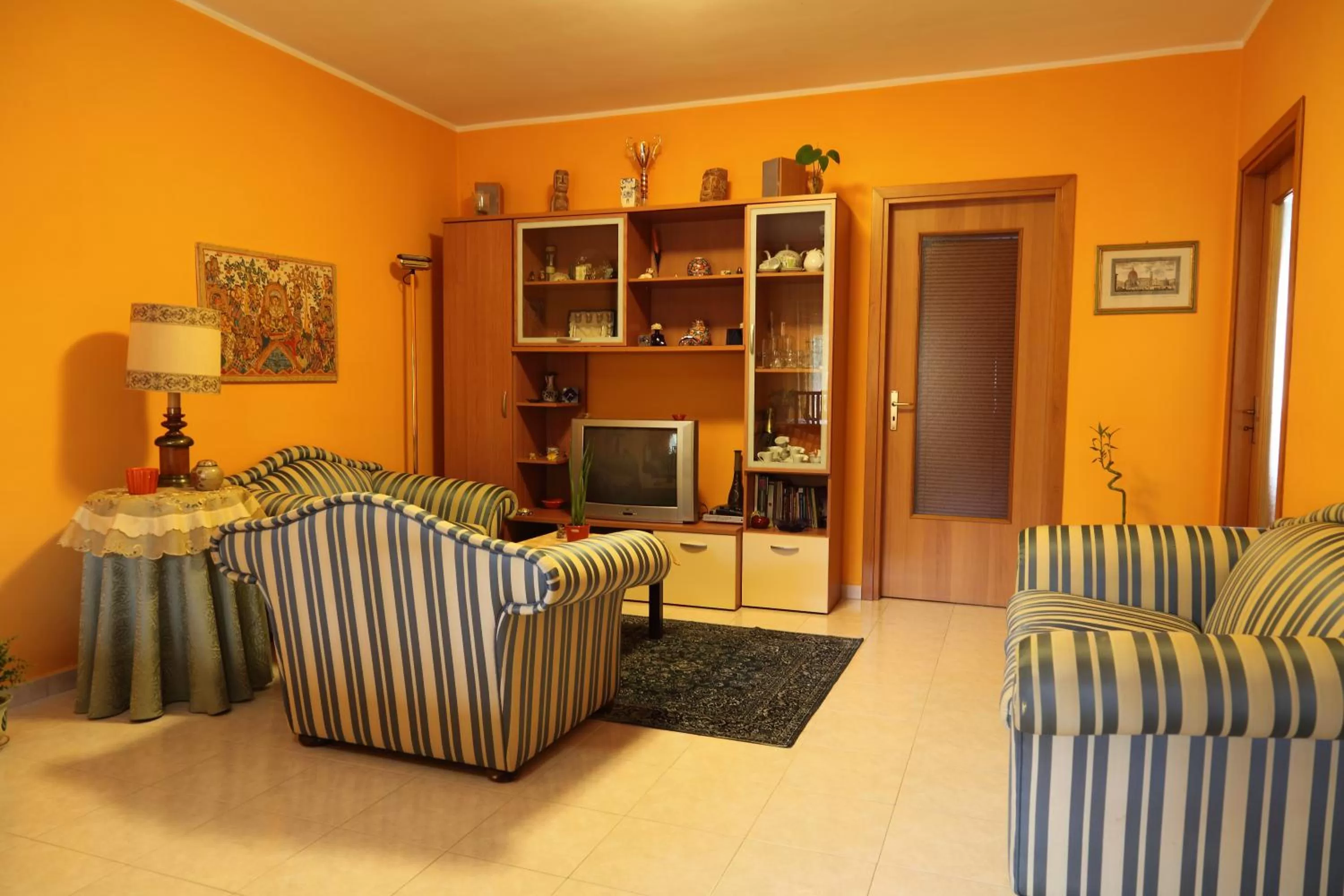 Communal lounge/ TV room in B&B La Villetta