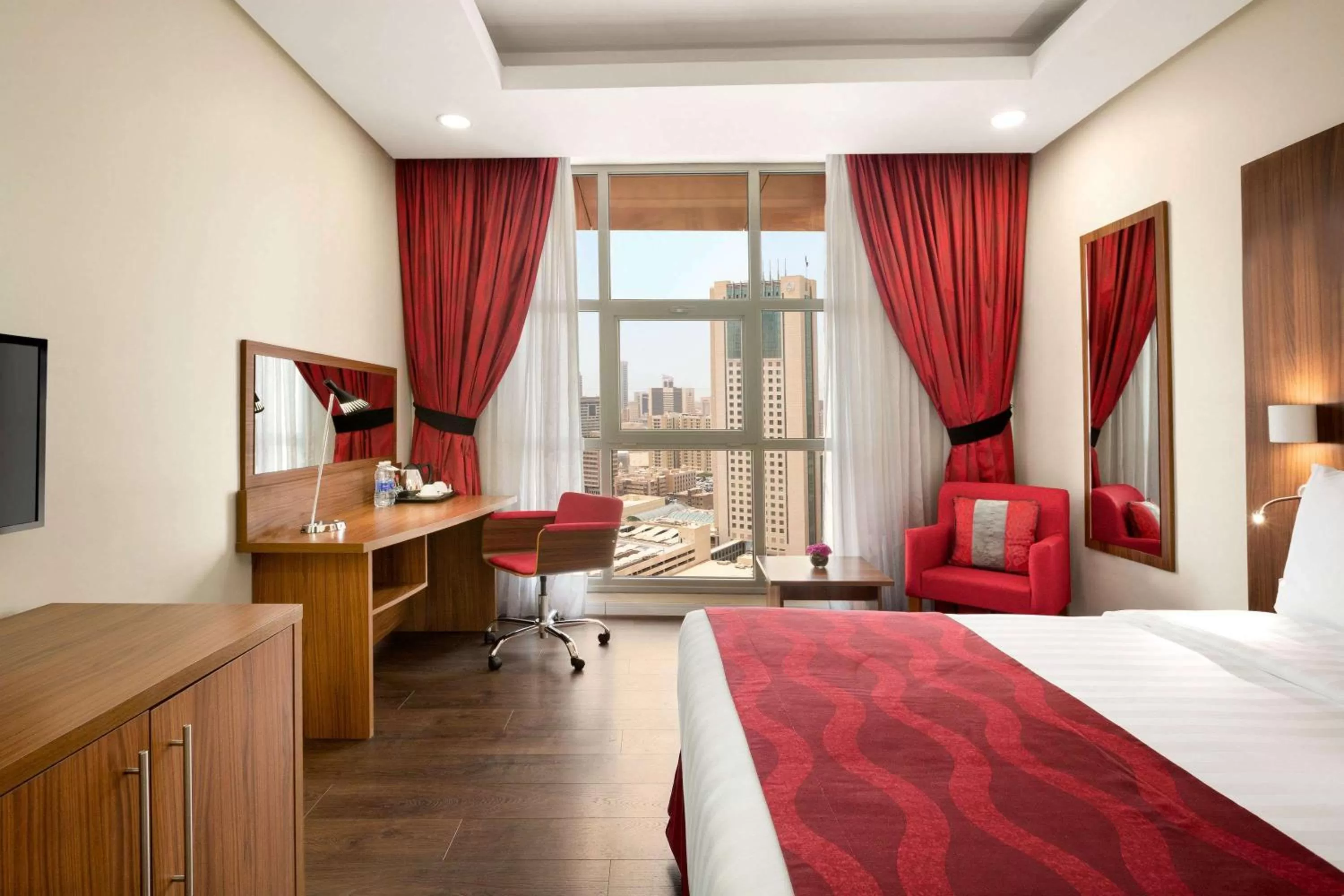 Photo of the whole room, Bed in Ramada Encore by Wyndham Kuwait Downtown