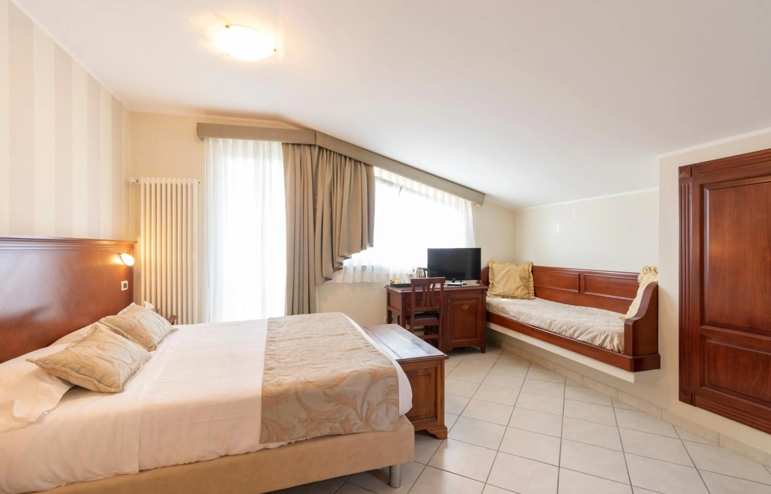 Bed in Hotel Villa Tiziana