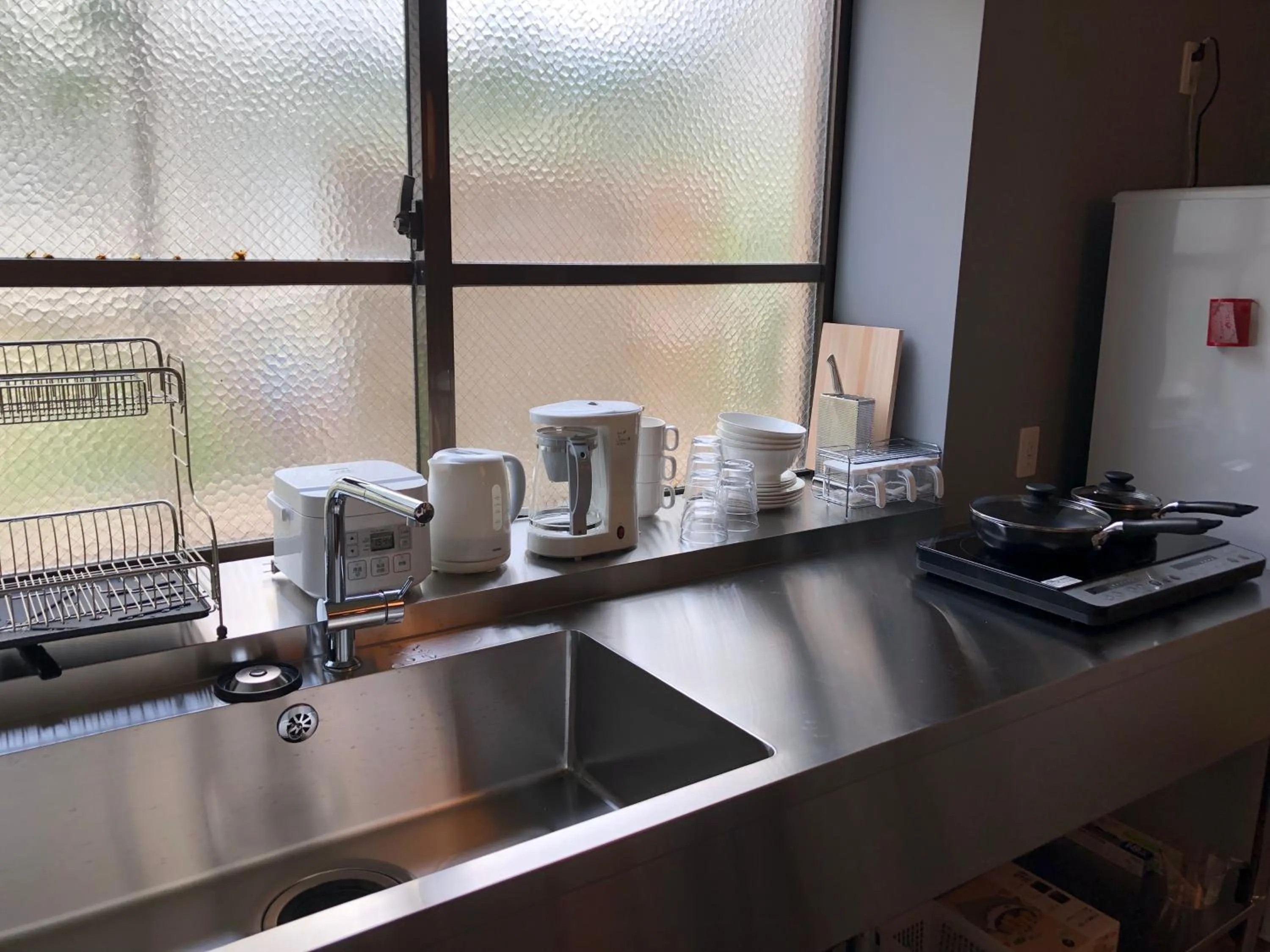 Property building in Santiago Guesthouse Naha