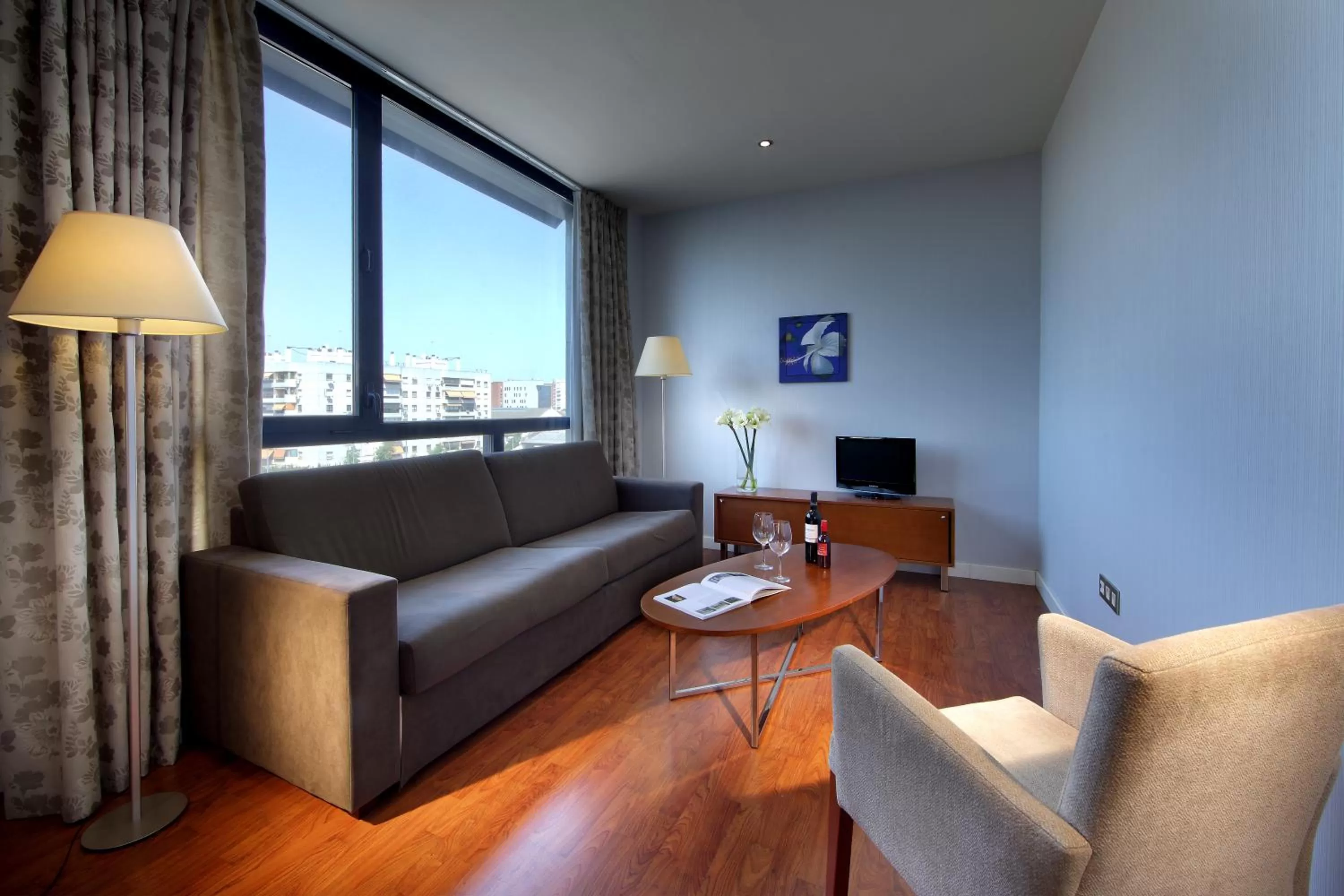 Living room in Exe Sevilla Palmera