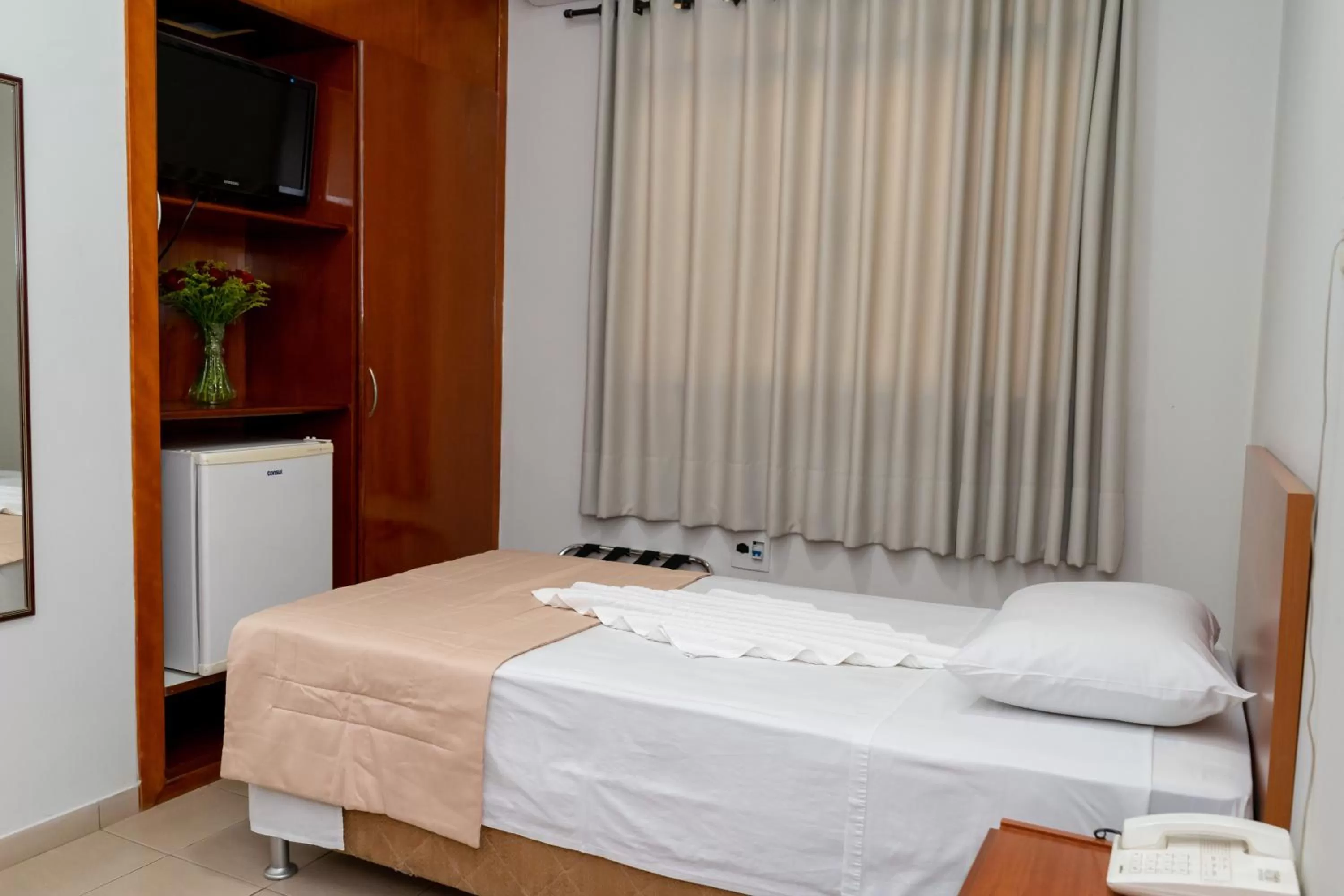 Bed in Bandeirantes Hotel