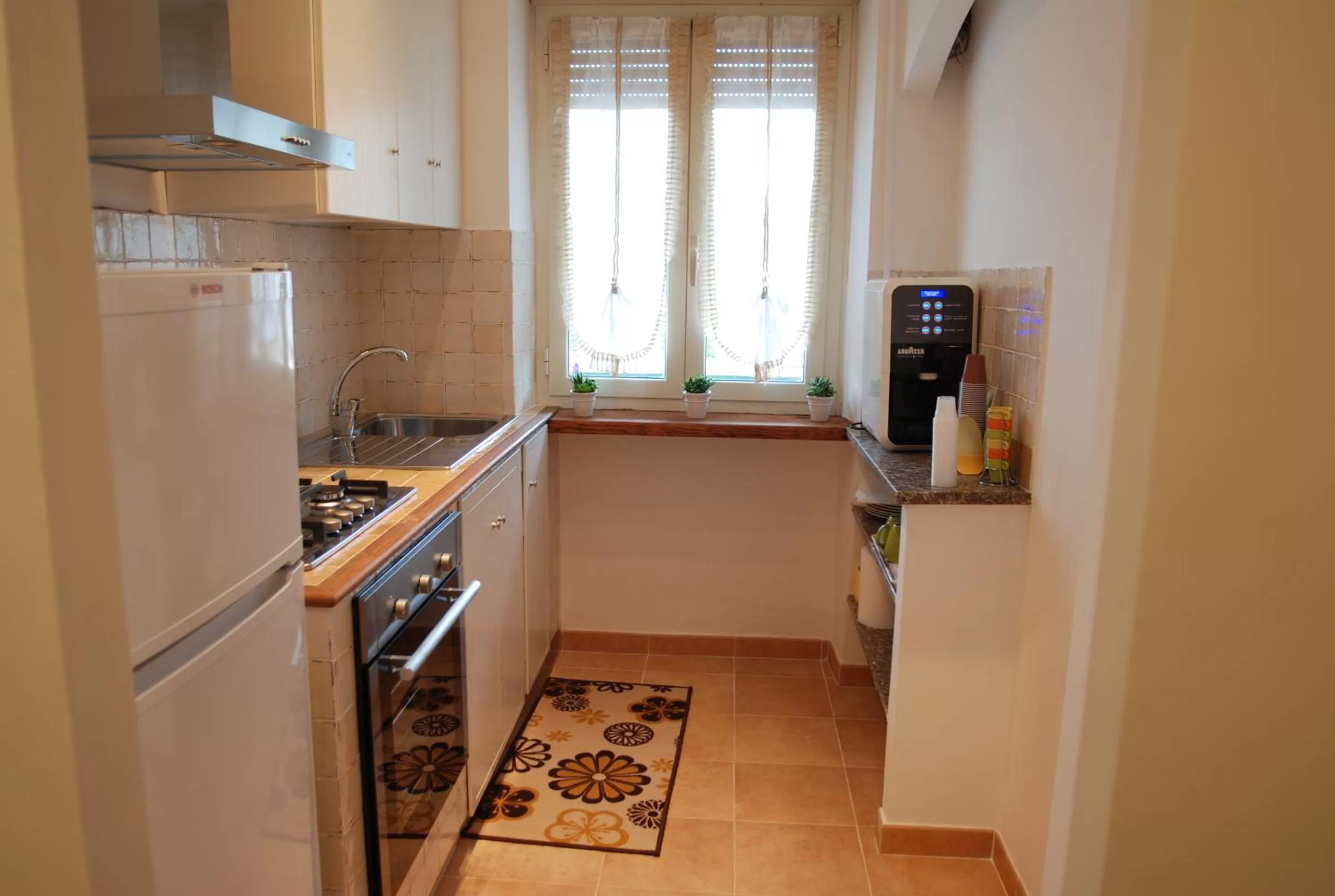 Kitchen or kitchenette in La Cannella