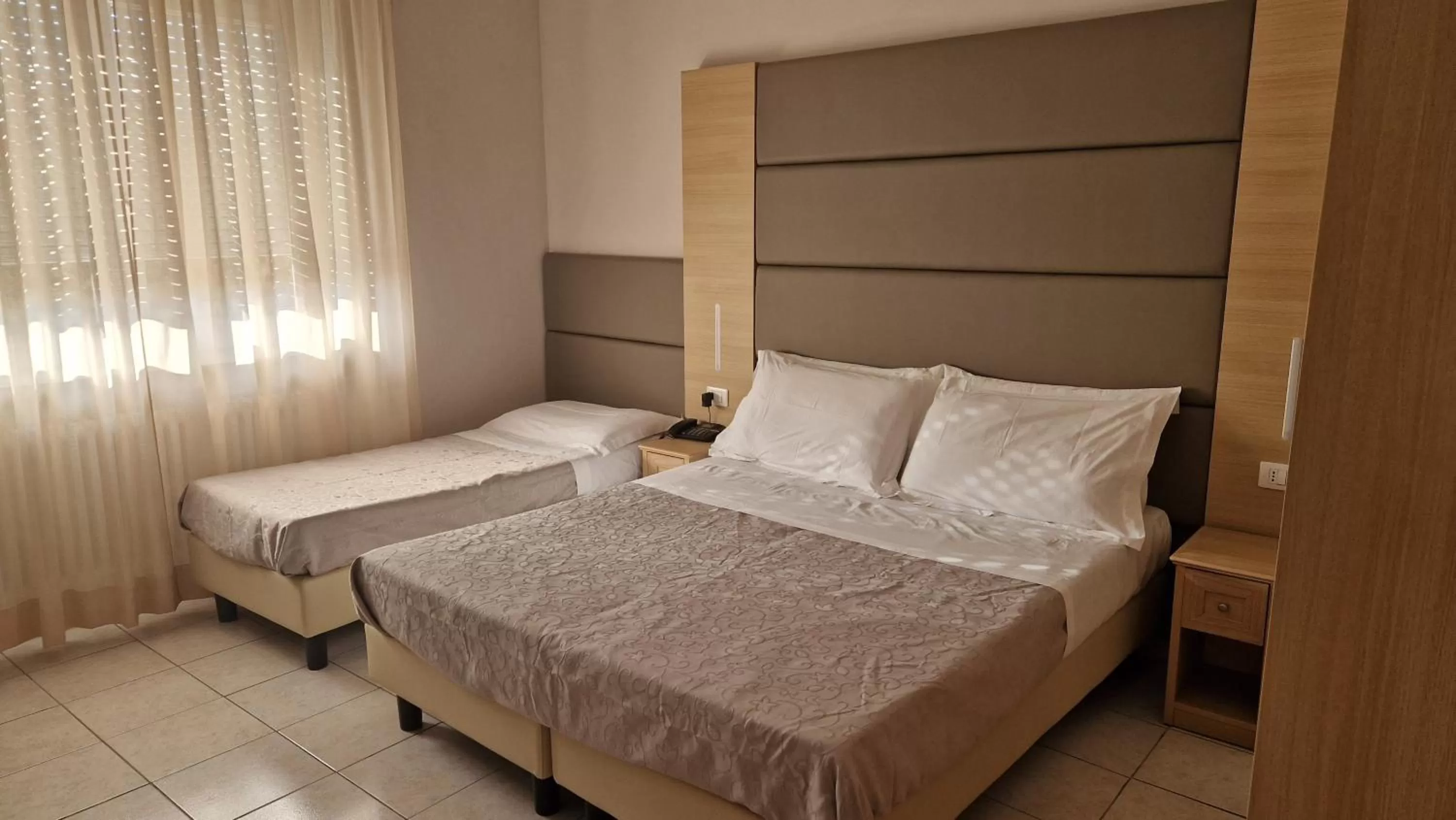 Bed in Hotel Trasimeno Bittarelli