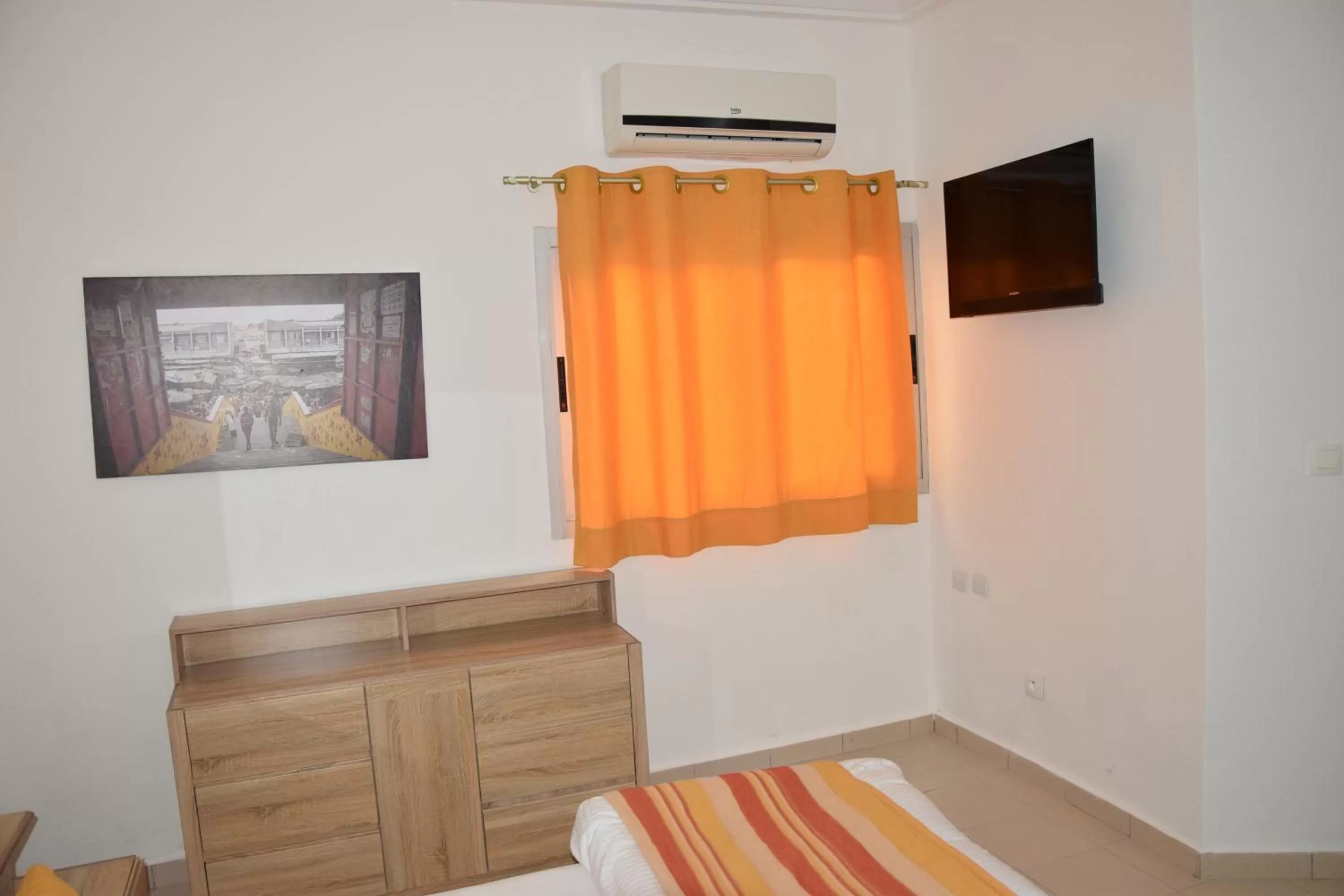 Communal lounge/ TV room, Bed in Hotel Le Marly