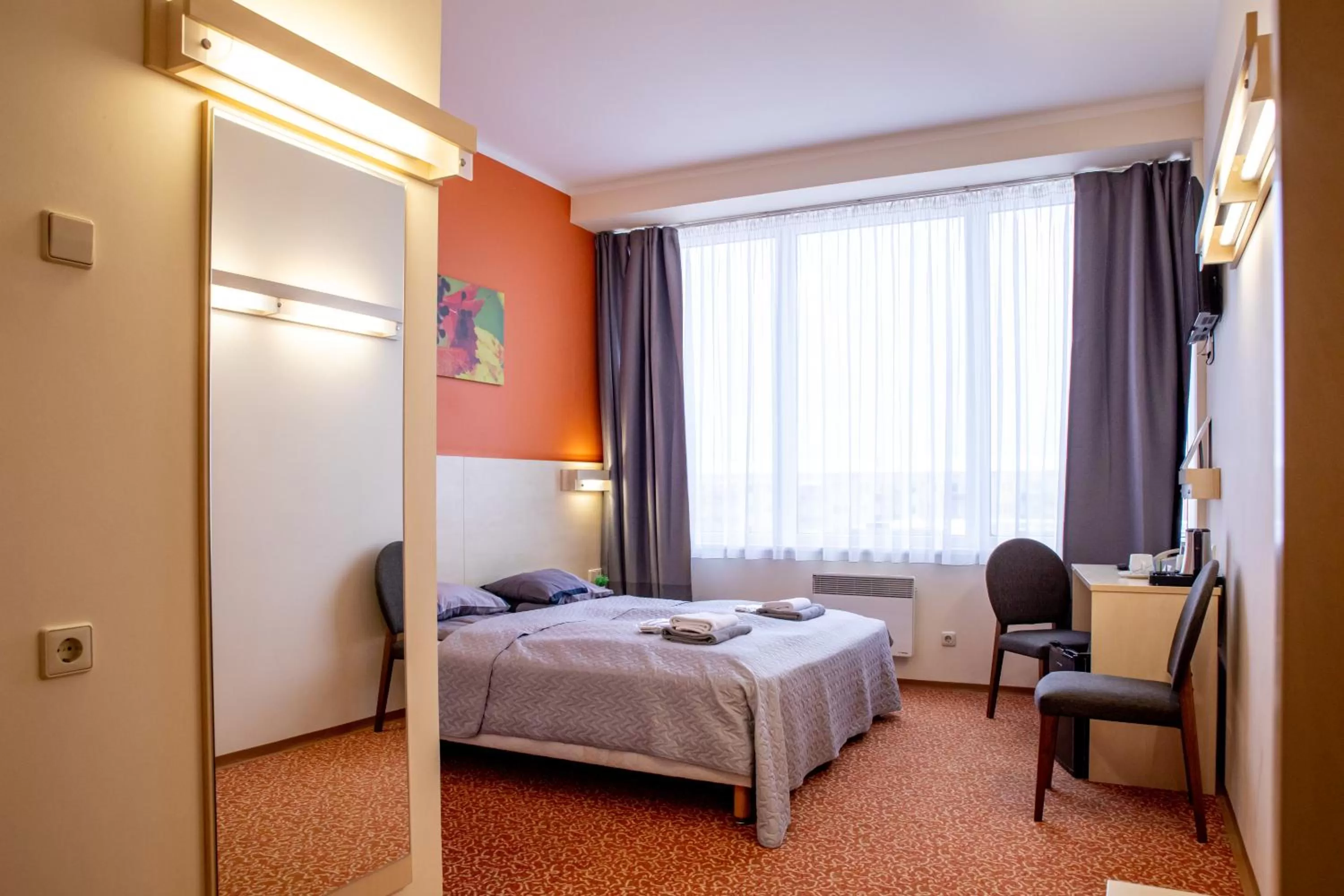 Bed in Rija Bauska Hotel