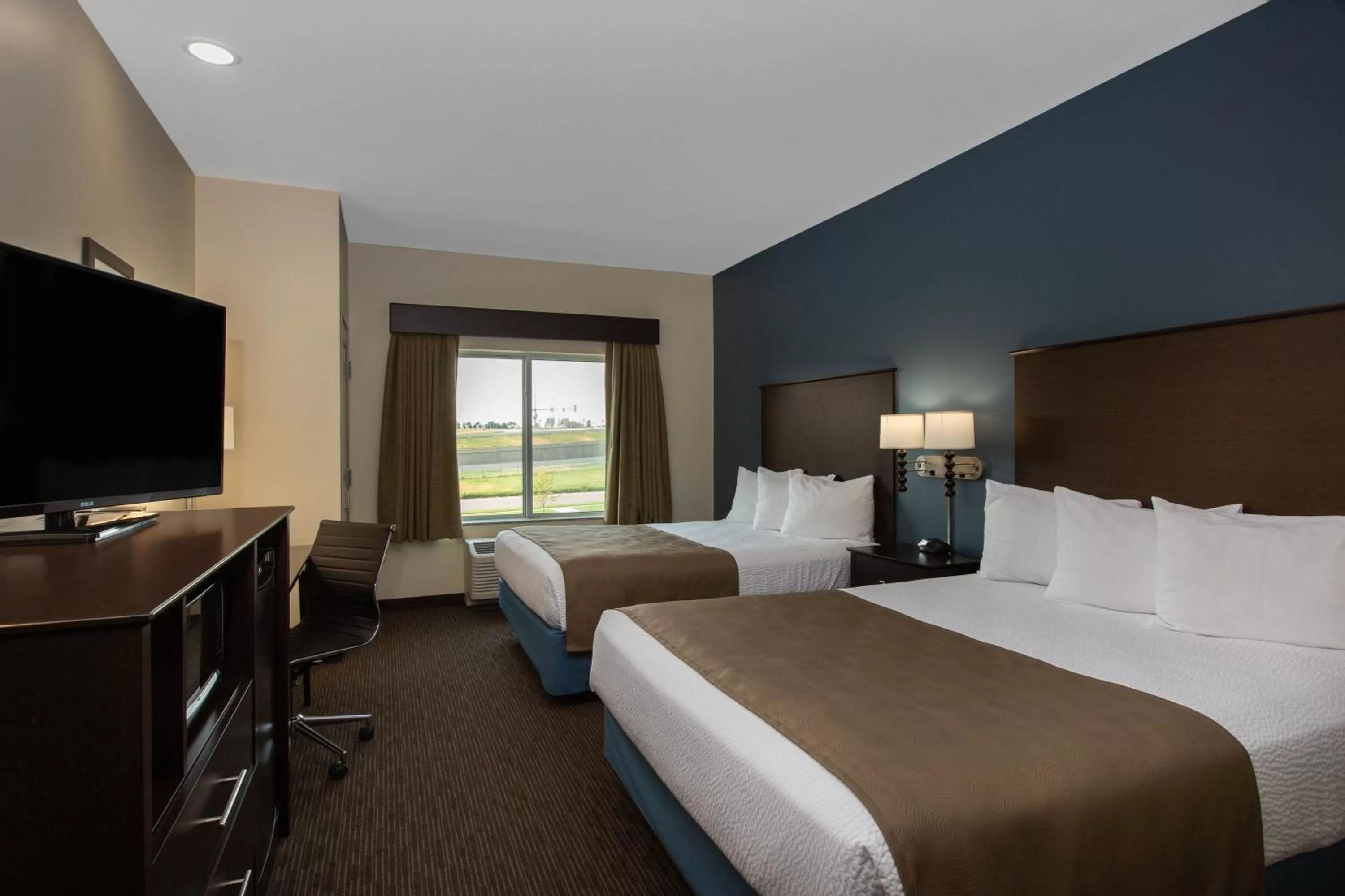 Photo of the whole room, Bed in AmericInn by Wyndham Sioux Falls North