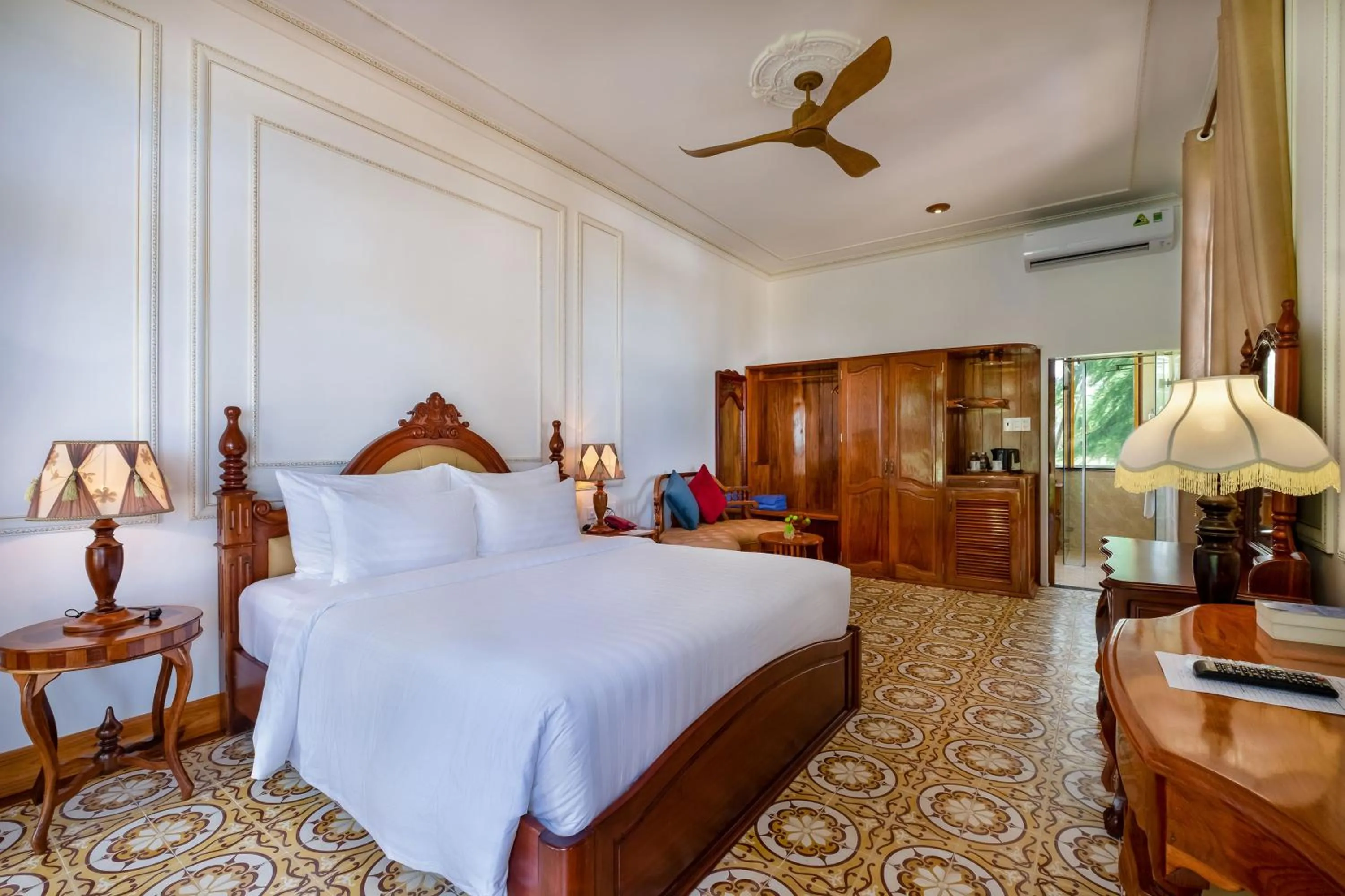 Bed in Coco Palm Beach Resort