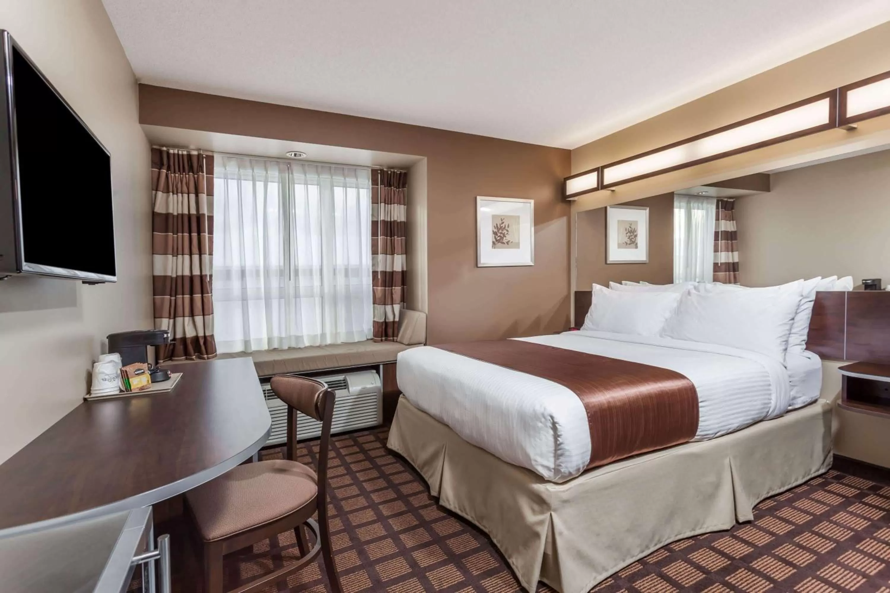 Photo of the whole room, Bed in Microtel Inn & Suites by Wyndham - Timmins