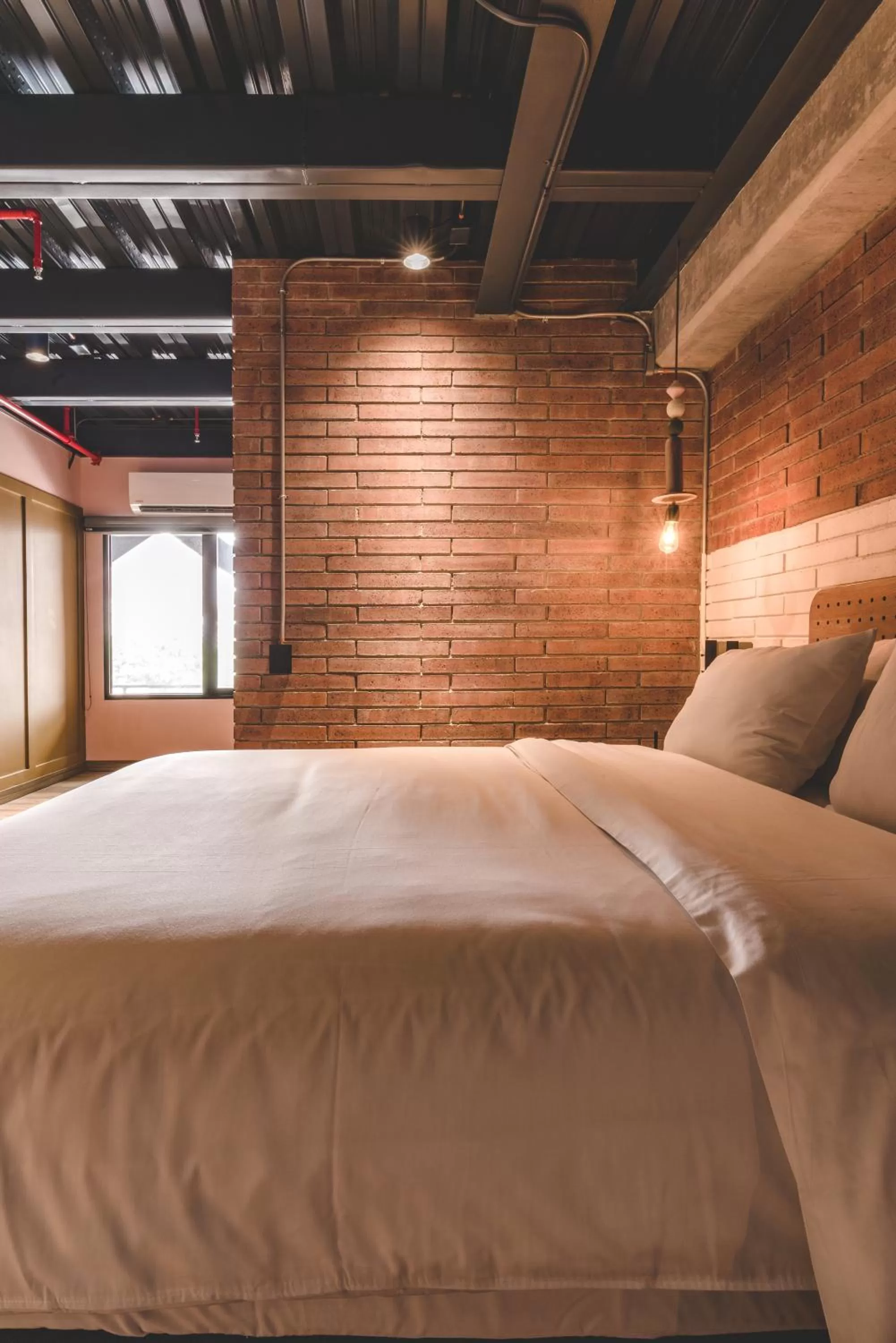 Bed in The Somos Beats Hotel & Rooftop