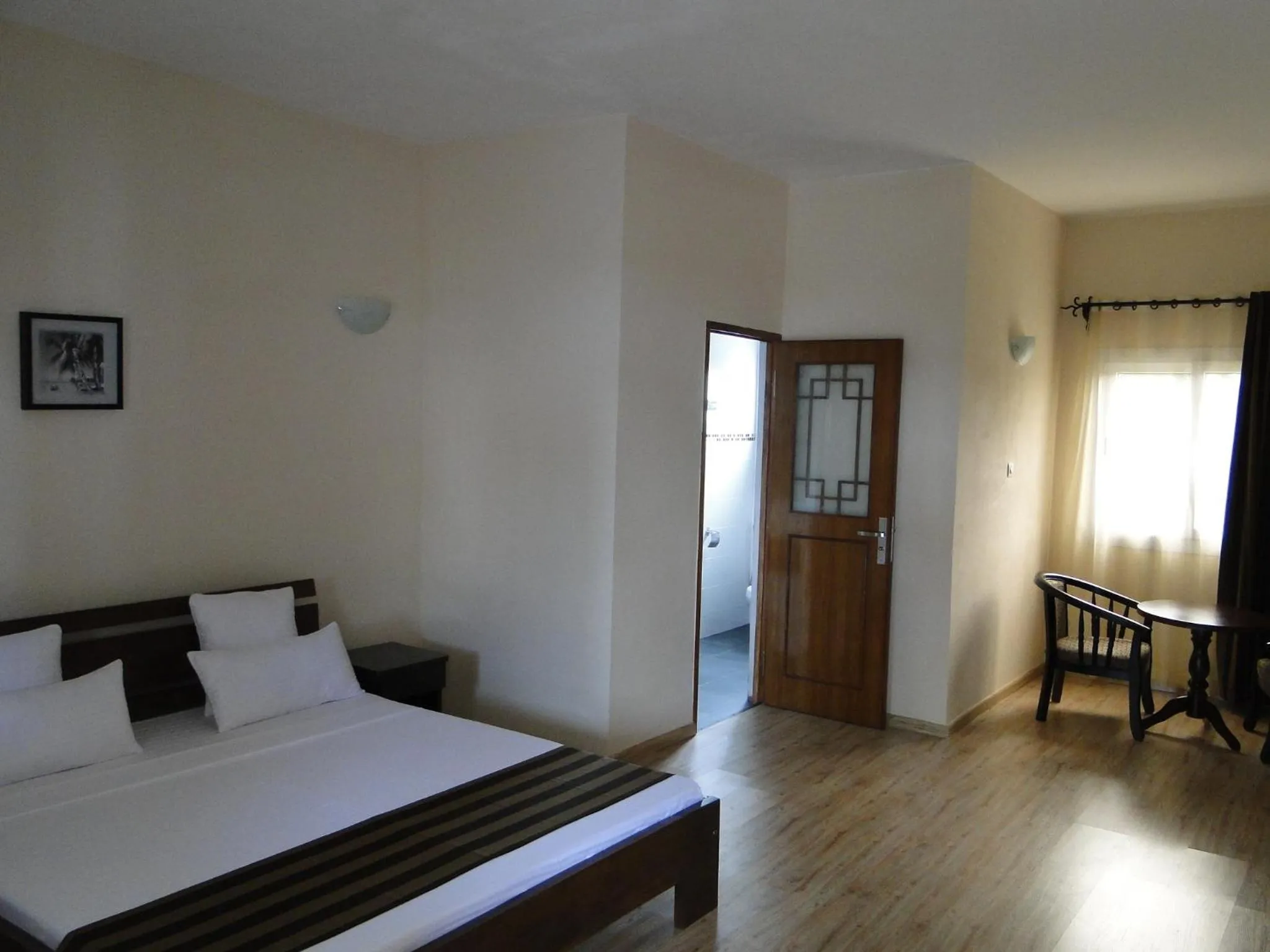 Photo of the whole room, Bed in Hotel H1 Antsirabe