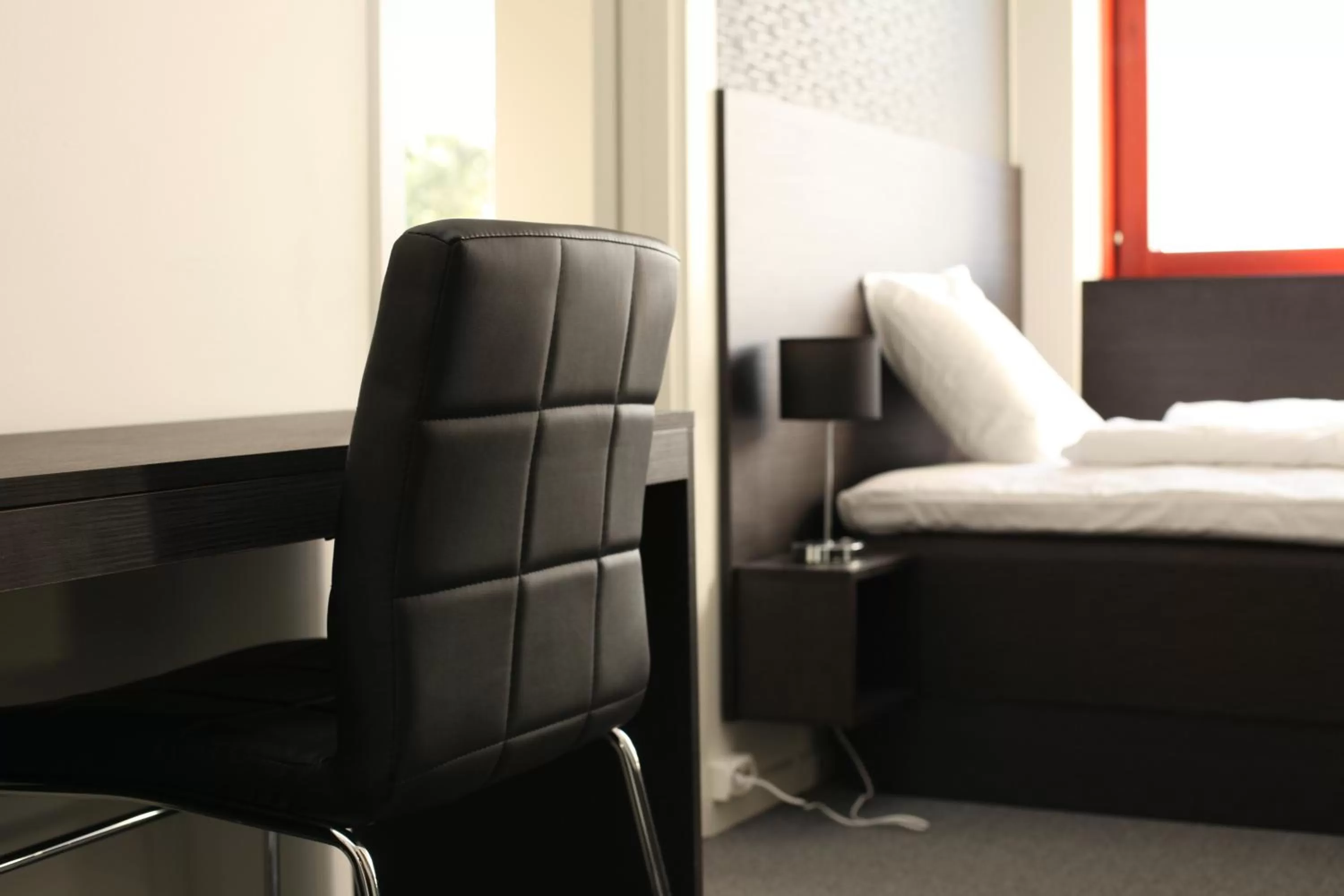 Photo of the whole room, Bed in Nacka Stadshotell