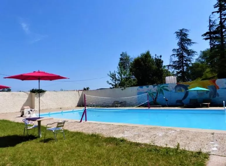Swimming pool in Le Relais de la RN7