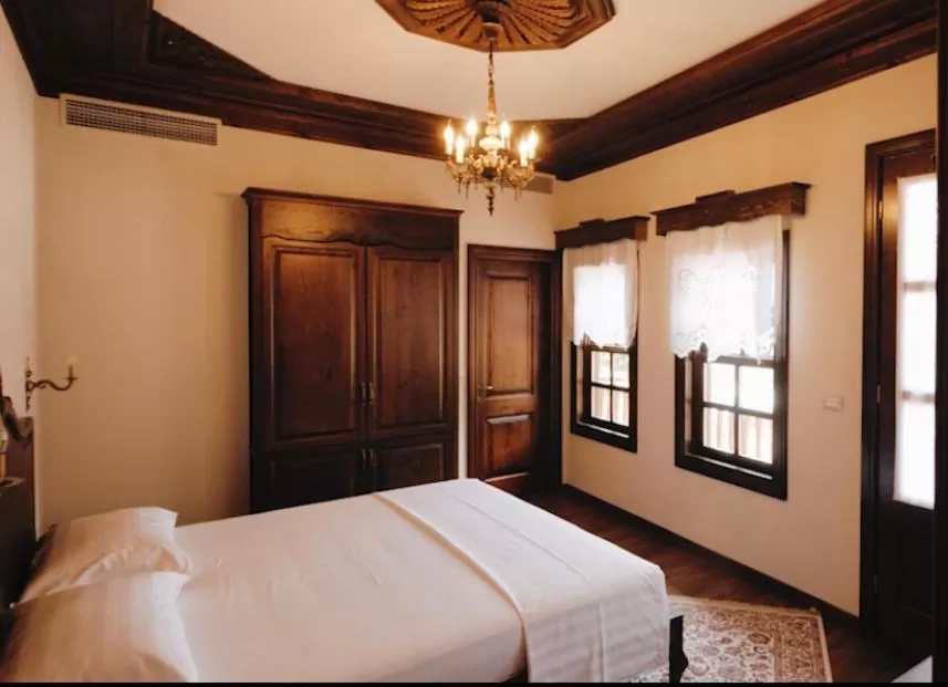 Bed in Beratino Hotel