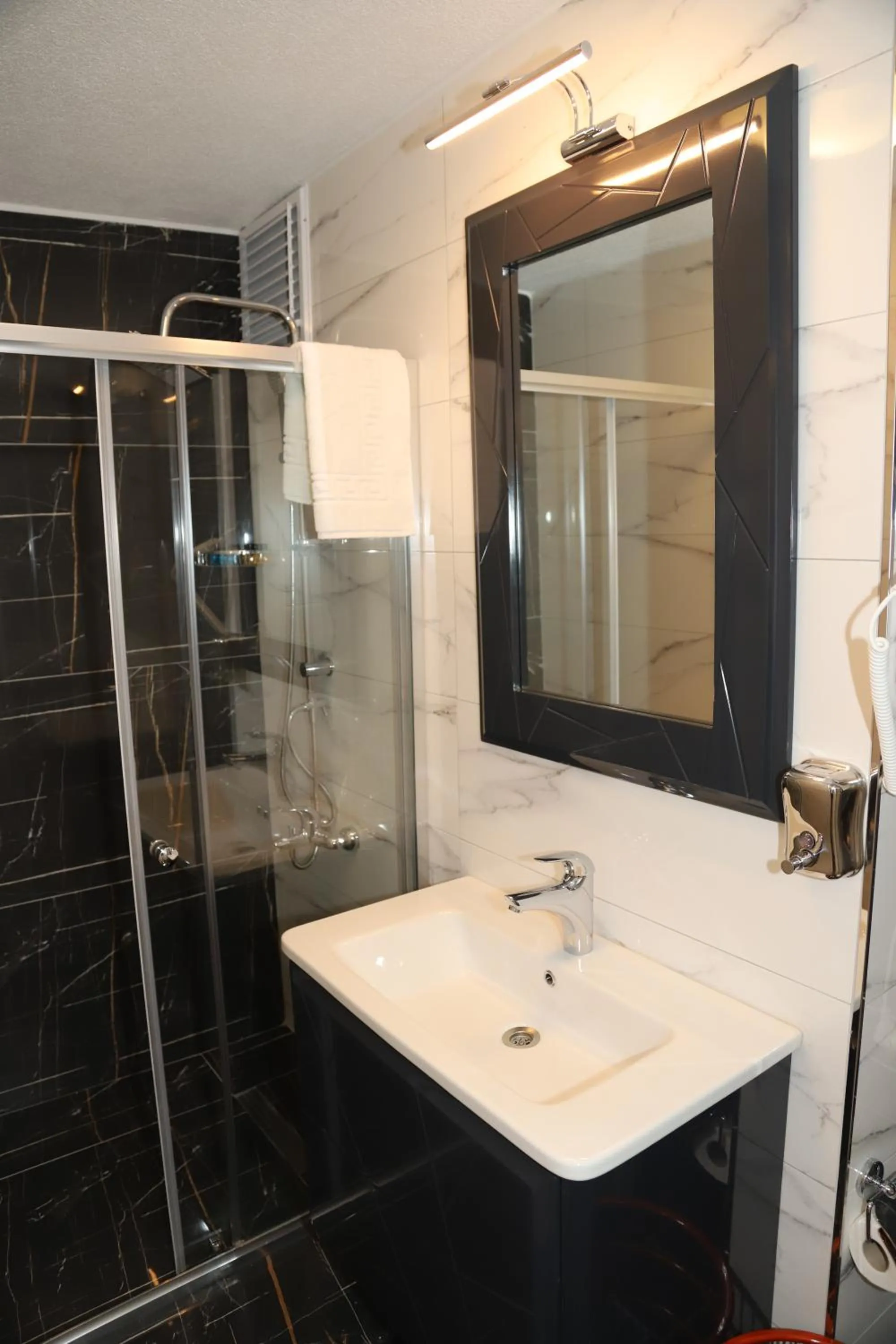 Shower in Grand Kavi Hotel