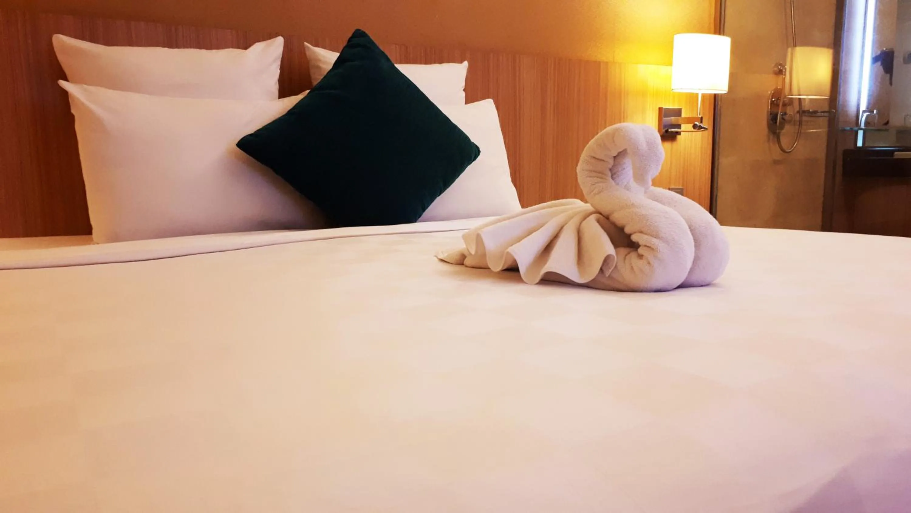 Bed in Novotel Surabaya Hotel