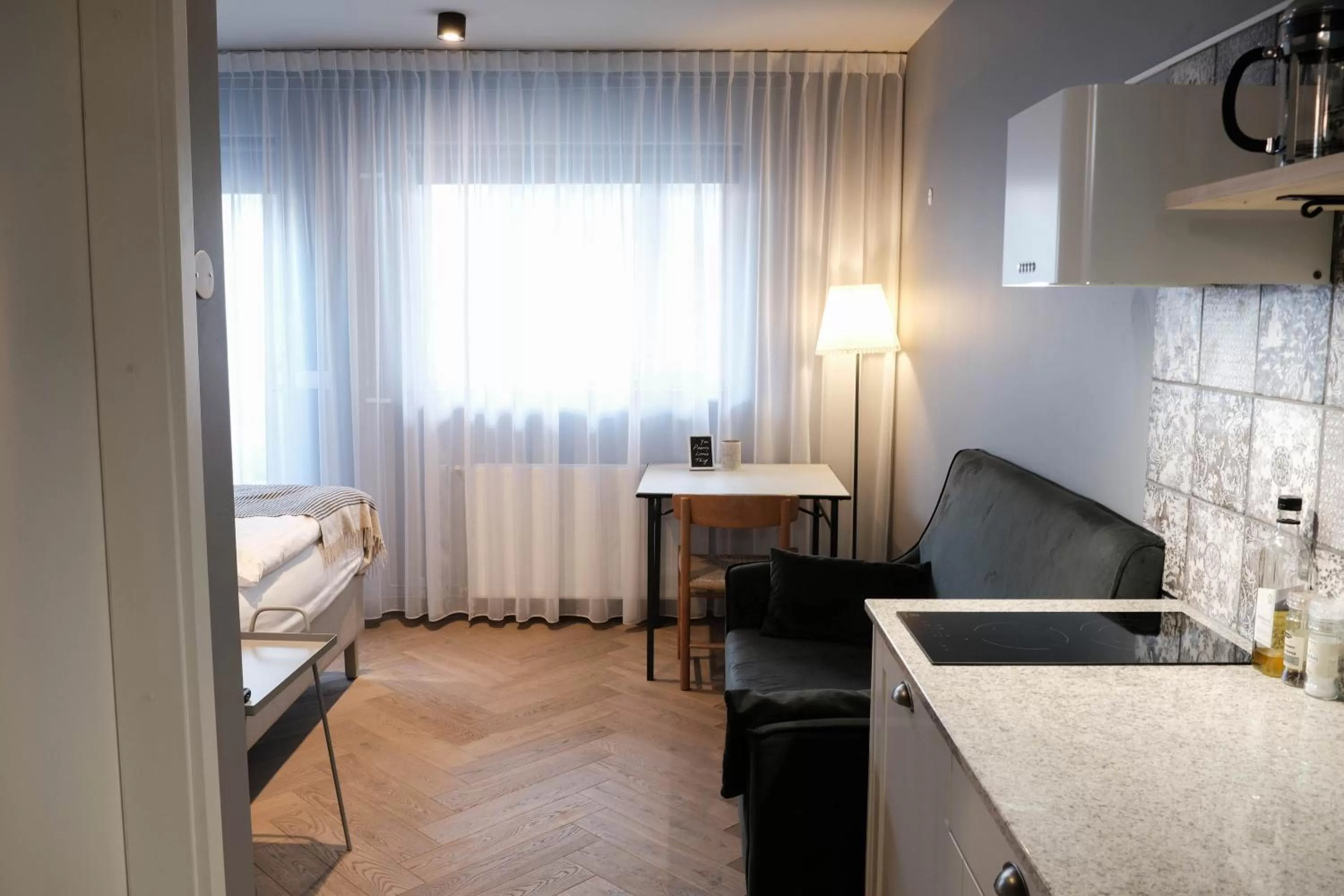 Kitchen or kitchenette, Bed in Saga Studios by Heimaleiga