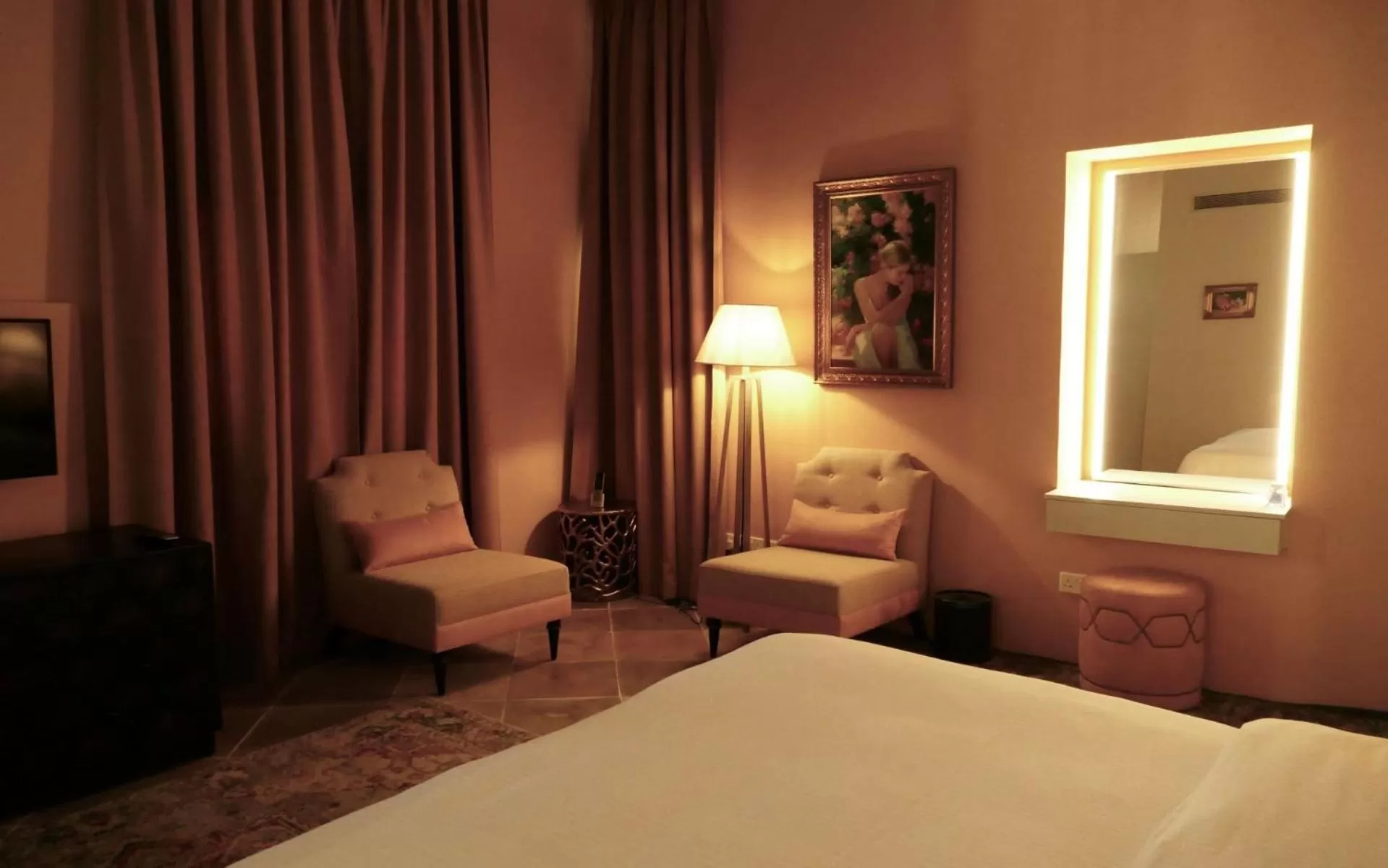 Seating area, Bed in Madama Residence