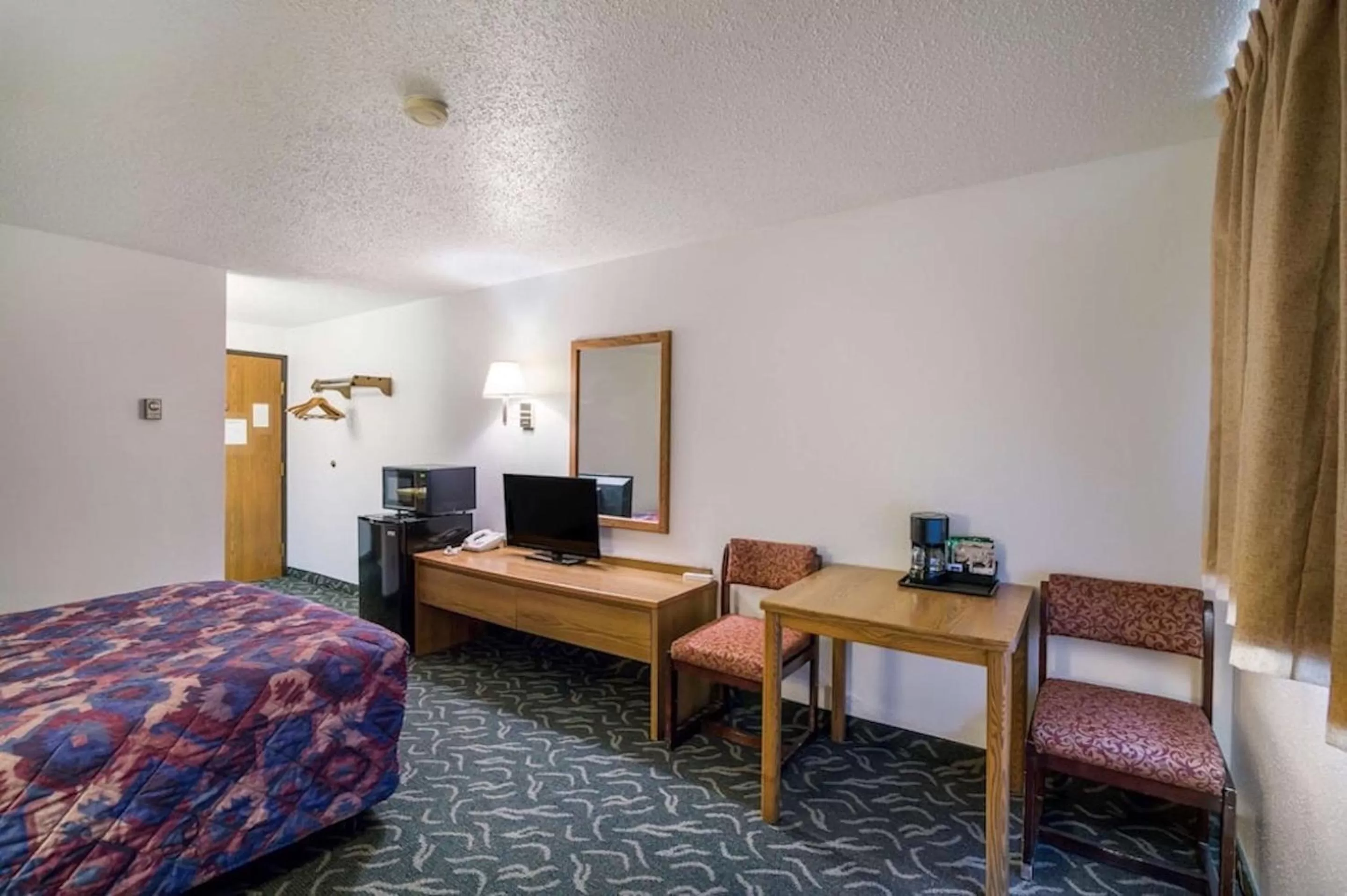 Bed in Rodeway Inn Gateway to Medora T-Roosevelt & Makoshika State Park