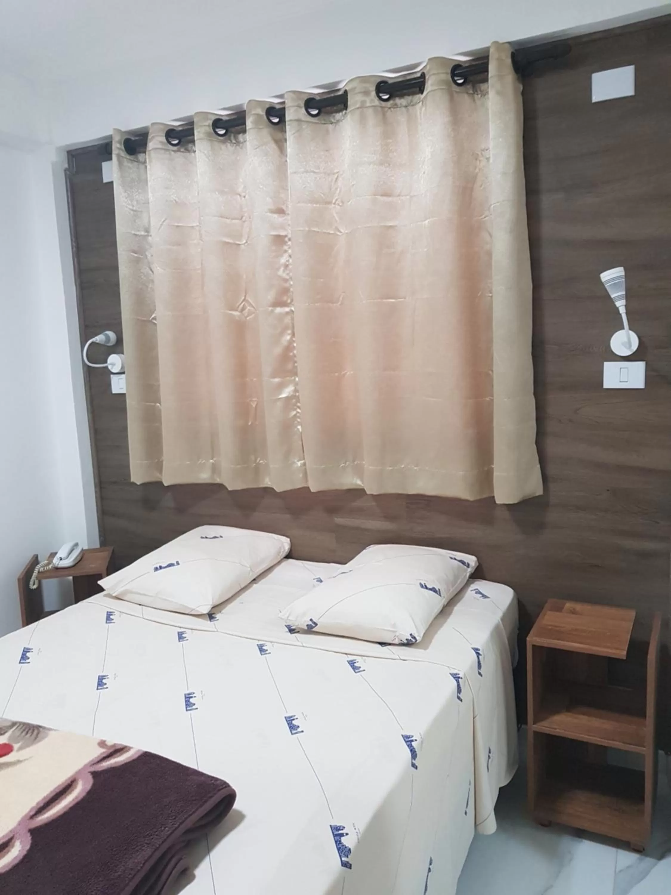 Bed in New Point Hotel