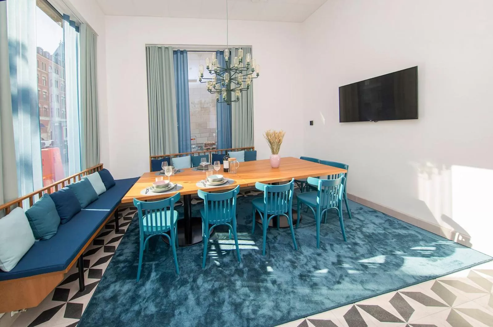 Communal lounge/ TV room, Dining Area in Staykvick Boutique Hostel