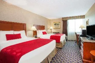 Deluxe Queen Room with Two Queen Beds - Mobility Access/Non-Smoking - Newly Renovated! in Ramada by Wyndham Jacksonville I-95 by Butler Blvd