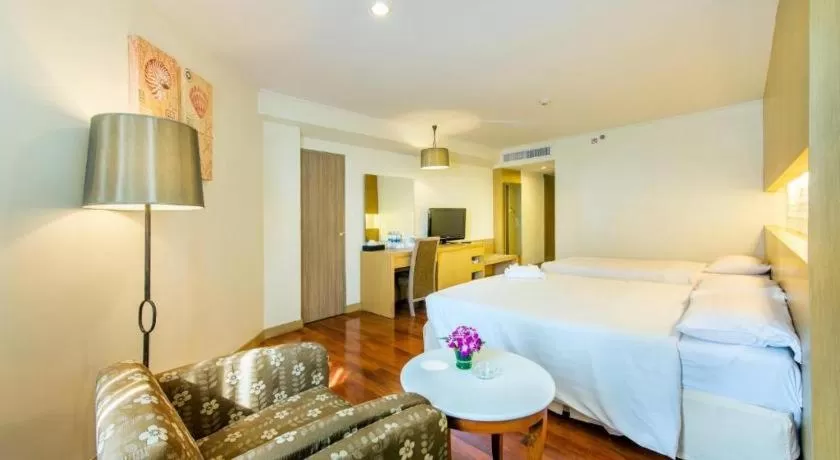 Bed in Jomtien Palm Beach Hotel and Resort