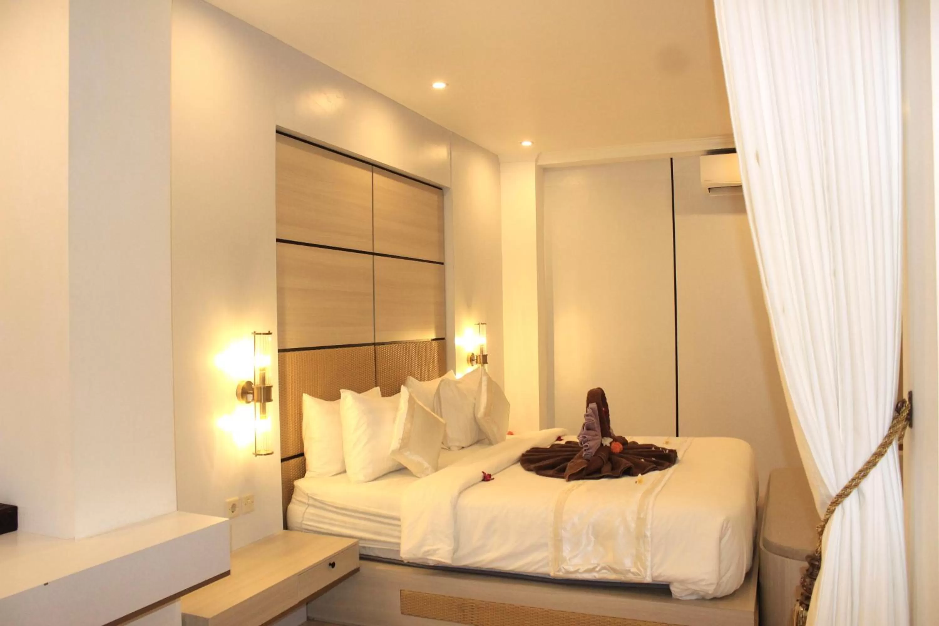 Bed in SUITE OCEAN BLUE