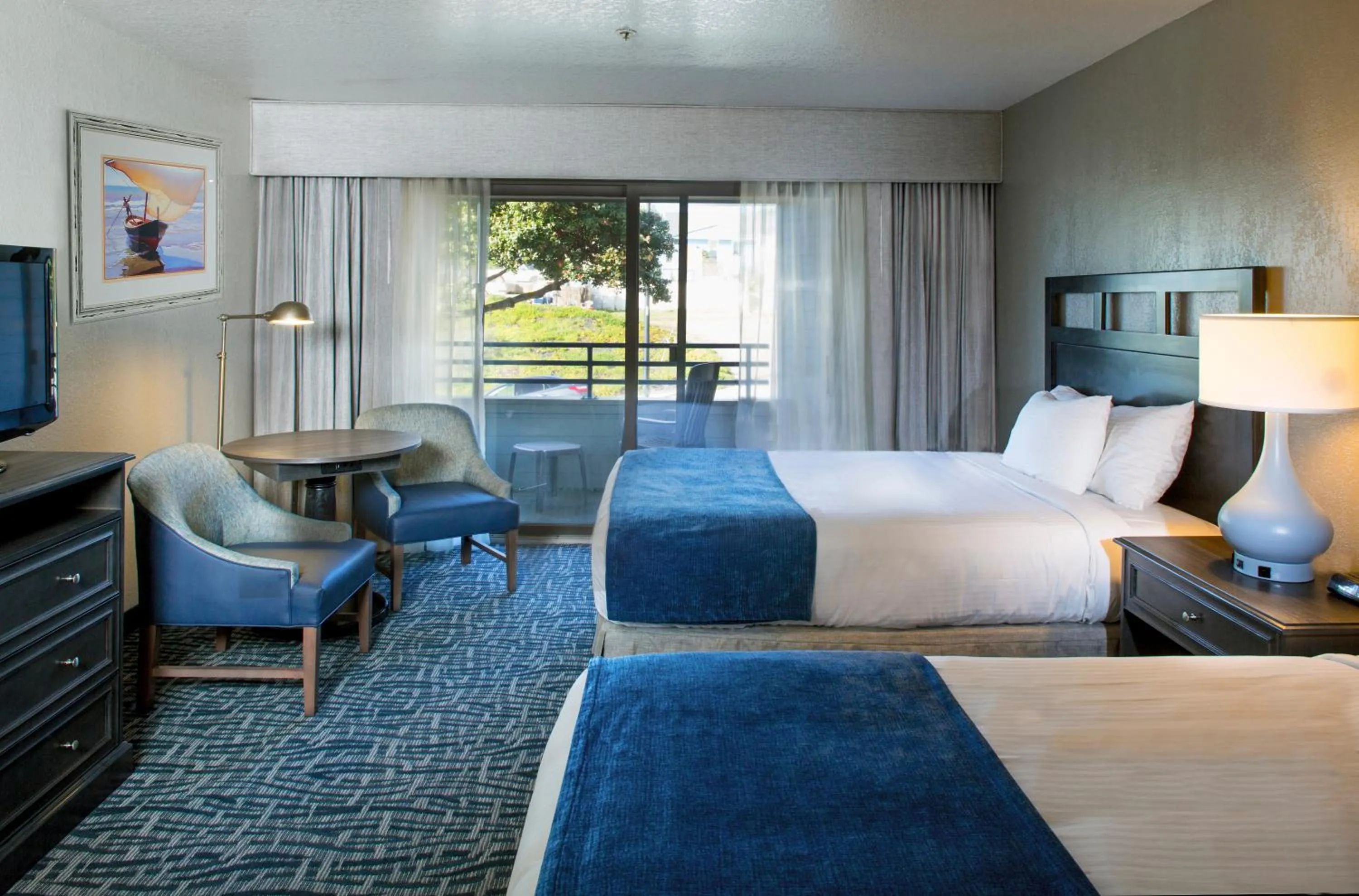 Photo of the whole room, Bed in Blue Sail Inn