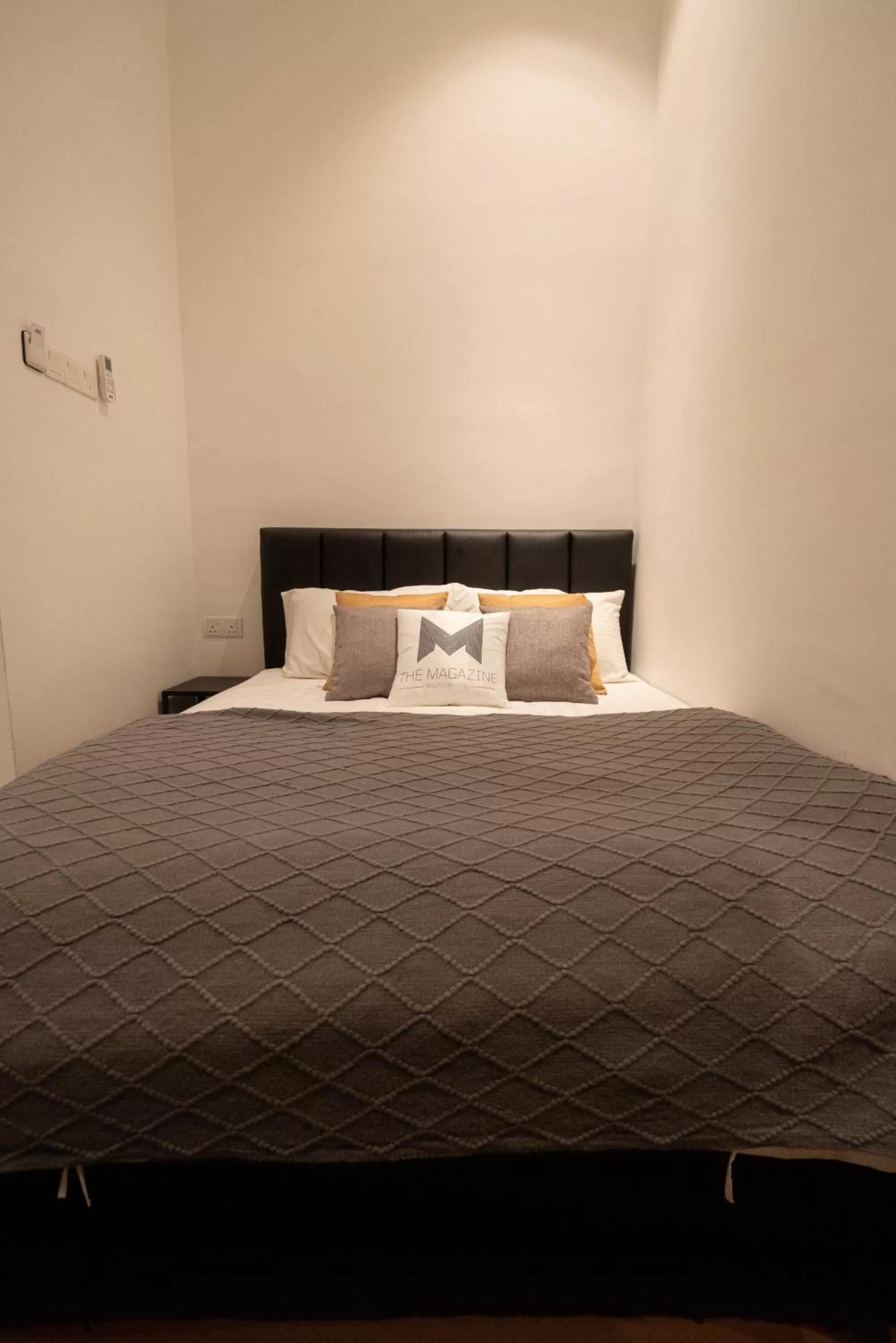 Bed in The Magazine Boutique Hotel