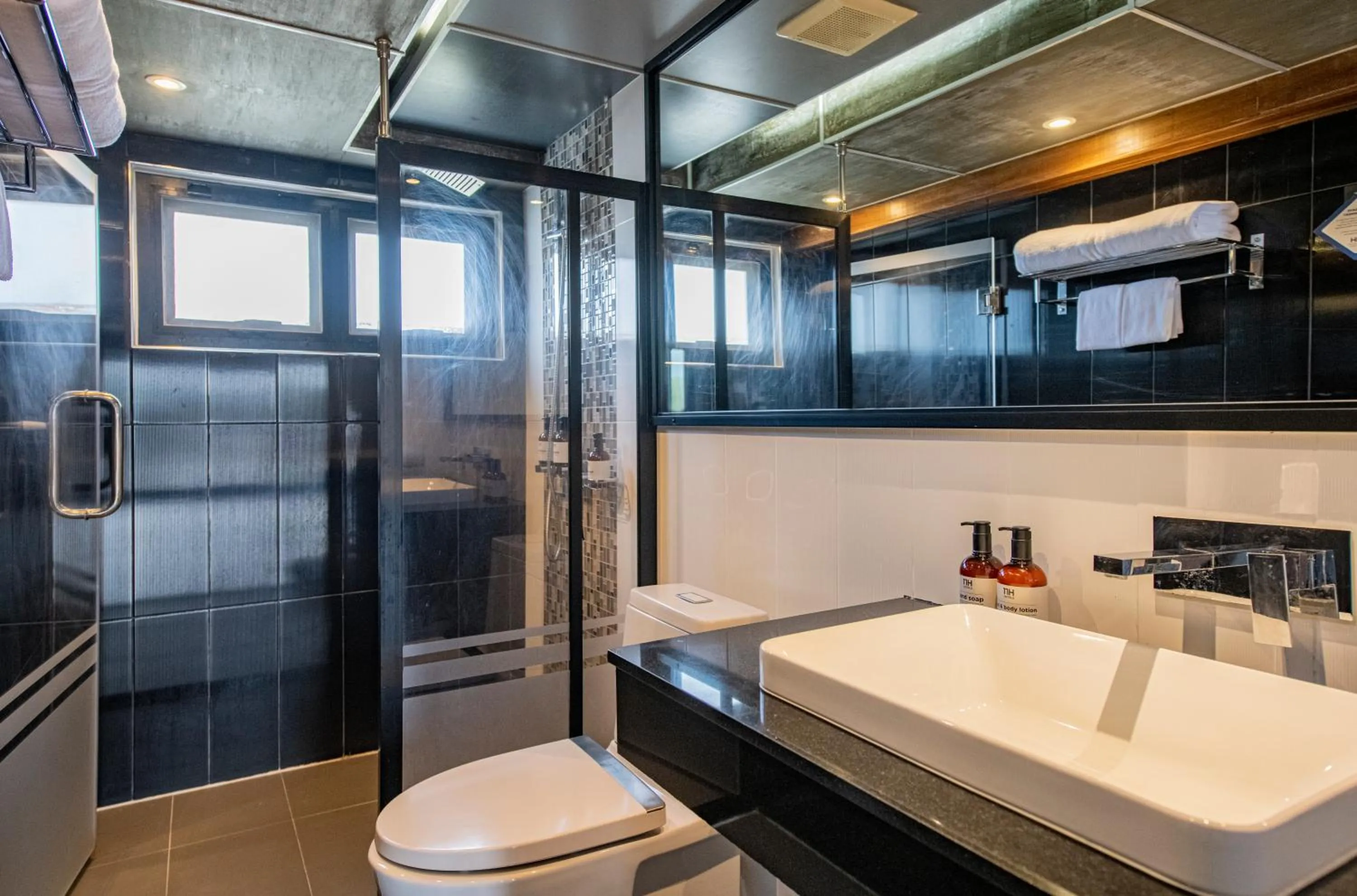 Shower in NH Boat Lagoon Phuket Resort